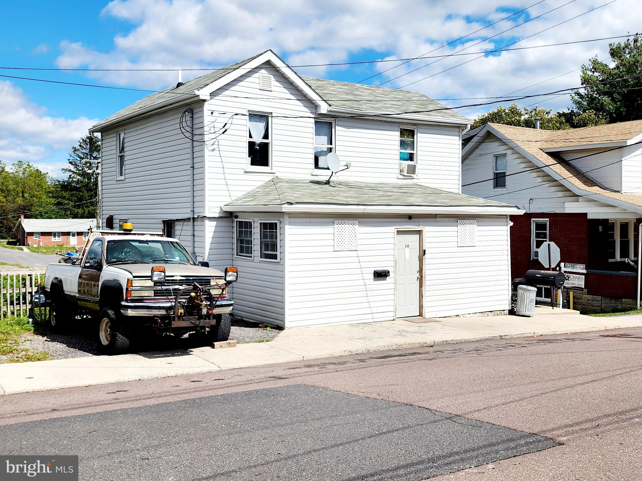 4 bedrooms, 2 full bathrooms directly across from Frostburg State University! Let's go BOBCATS! This property has so much income potential with off street parking in the front & back & the basement could be finished as a separate unit for additional income (check with city for regulations). Currently leased month to month but could easily be rented out per semester for even more income! Steps from campus and just a short walk to Main Street to enjoy all the awesome town of Frostburg has to offer! Don't miss your chance to own in Frostburg and start making some money!