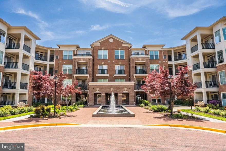Welcome to this stunning renovated three-bedroom, two-and-a-half bath condo at Saintsbury Plaza, a vibrant 55+ community that's just a few blocks away from the Vienna Metro station. This condo is located on the fourth floor and boasts lovely views of the trees, creating a serene and peaceful environment. The open-concept floor plan is perfect for entertaining, with a kitchen featuring custom-tiled back-splash, granite countertops, stainless appliances, 42” cabinets. The living room is filled with natural light and features a cozy fireplace, crown molding, and plantation shutters, and provides access to the balcony, where you can enjoy a picturesque view of nature and the East Blake Lane Park. The dining room has crown molding. The master bedroom is generously sized and features two closets, including a walk-in closet, and an en-suite bathroom with double sinks, a soaking tub, separate shower, and a dressing vanity. Two additional bedrooms offer privacy and are serviced by one full bathroom. All windows in the condo have plantation shutters. For added convenience, there is a full-size washer and dryer located off the front hallway. The unit comes with one designated parking space and a storage unit. Saintsbury Plaza offers numerous amenities, including a club room, fitness room, library, and a peaceful courtyard with a fountain. The condo association sponsors quarterly social gatherings. This active community is also conveniently located near Safeway, Giant, access to I-66, Lee Highway, Rt. 50, Nottoway Park, the Vienna Dog Park, and walking trails, including the Cross-County Trail. Don't miss out on the chance to call this beautiful condo your own!  Please park on the "visitor parking" in the left back of the building.
