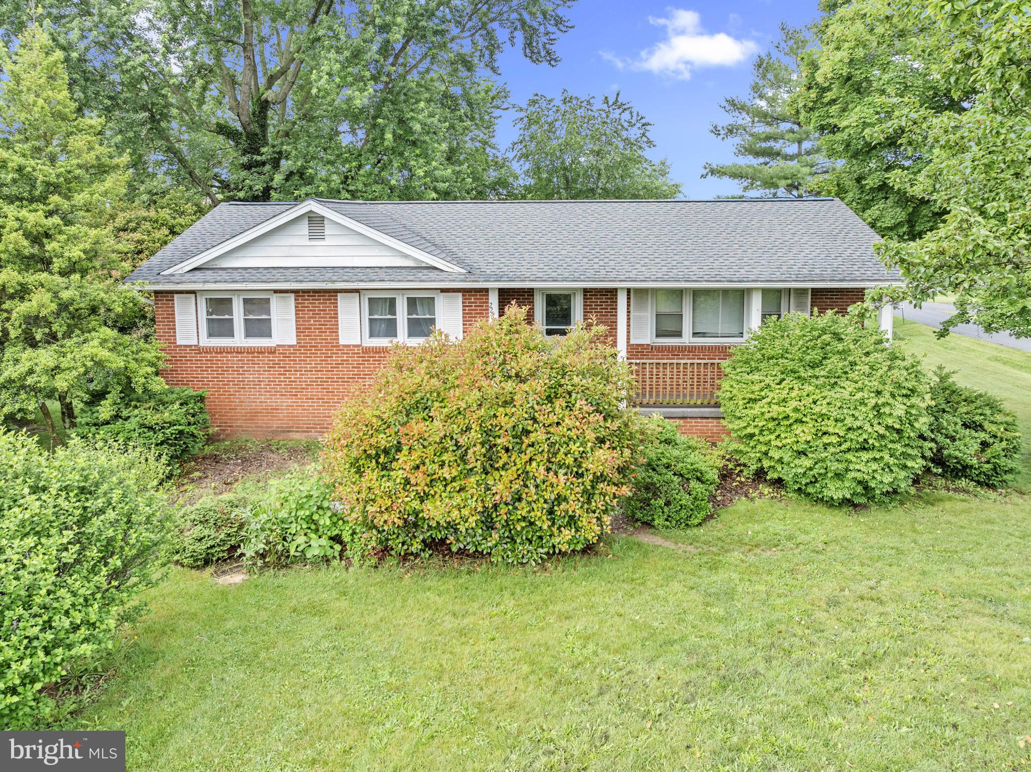 **Back Active at no fault of Seller***Welcome home to this beautiful and spacious 3-bedroom, 2-bath ranch-style home, ideally situated on a desirable corner lot in Edinburg, VA! Sitting on nearly half an acre (.46 ac), this property offers both comfort and convenience just minutes from the town of Woodstock, VA.
As you enter from the charming covered front porch, you’ll appreciate the easy flow of the main level floor plan. This level features a large living room, a separate dining room, a kitchen with views, three bedrooms, and a full bath. Underneath the carpet, original hardwood floors await your personal touch.
The finished walkout basement offers incredible additional living space, including a cozy family room, a second full bathroom, and four finished bonus rooms—perfect for extra bedrooms, office space, hobbies, or storage. The laundry area is also located downstairs for added convenience.
Enjoy outdoor living on the large, level corner lot—perfect for entertaining, gardening, or relaxing. Additional highlights include a brand-new roof and a prime location close to all that Woodstock has to offer. Brand New HVAC installed
Don’t miss the opportunity to make this well-loved and versatile home your own!