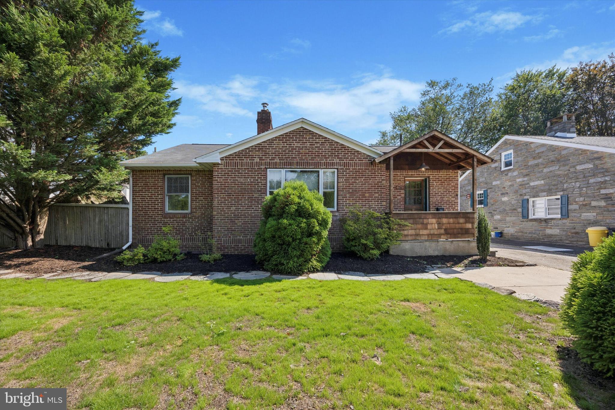 Welcome to 26 McCloskey Road in Flourtown. This unique and charming ranch home offers the perfect blend of comfort, accessibility, and convenience. From the beautifully landscaped front yard to the welcoming front porch, this home is as functional as it is inviting. There are three convenient entrances to the house, including one from the rear garden with no steps, an extra-long driveway with plenty of parking, getting in and out couldn’t be easier. You can even drive right up to the backyard for the ultimate convenience.
The spacious family room, filled with gorgeous natural light from oversized windows, is ideal for gatherings and opens directly to the large, private backyard with hydrangeas and your own fig tree ready for picking. The eat-in kitchen offers stainless steel appliances, ample cabinet and counter space, and is perfectly situated for entertaining.
The primary bedroom features an accessible en-suite bathroom, creating a comfortable private retreat. Two additional bedrooms and two more full baths provide plenty of room for family or guests. Just off the primary suite, a bright sunroom with skylights offers a perfect spot for relaxation as well as access to the basement.
The partially finished basement is expansive and holds so much potential! Think: family room, studio, game area, or rec space with the added bonus of storage, laundry, and an extra shower.
This home is walkable to all of the shops, restaurants, and attractions in Flourtown, including both swim clubs as well as well as minutes to Chestnut Hill, the Wissahickon Valley Park, and Rt 309 for an easy commute anywhere! With a fantastic backyard, this home offers accessibility, versatility, and charm all in one package, this one won't last. Make your appointment to view it today!