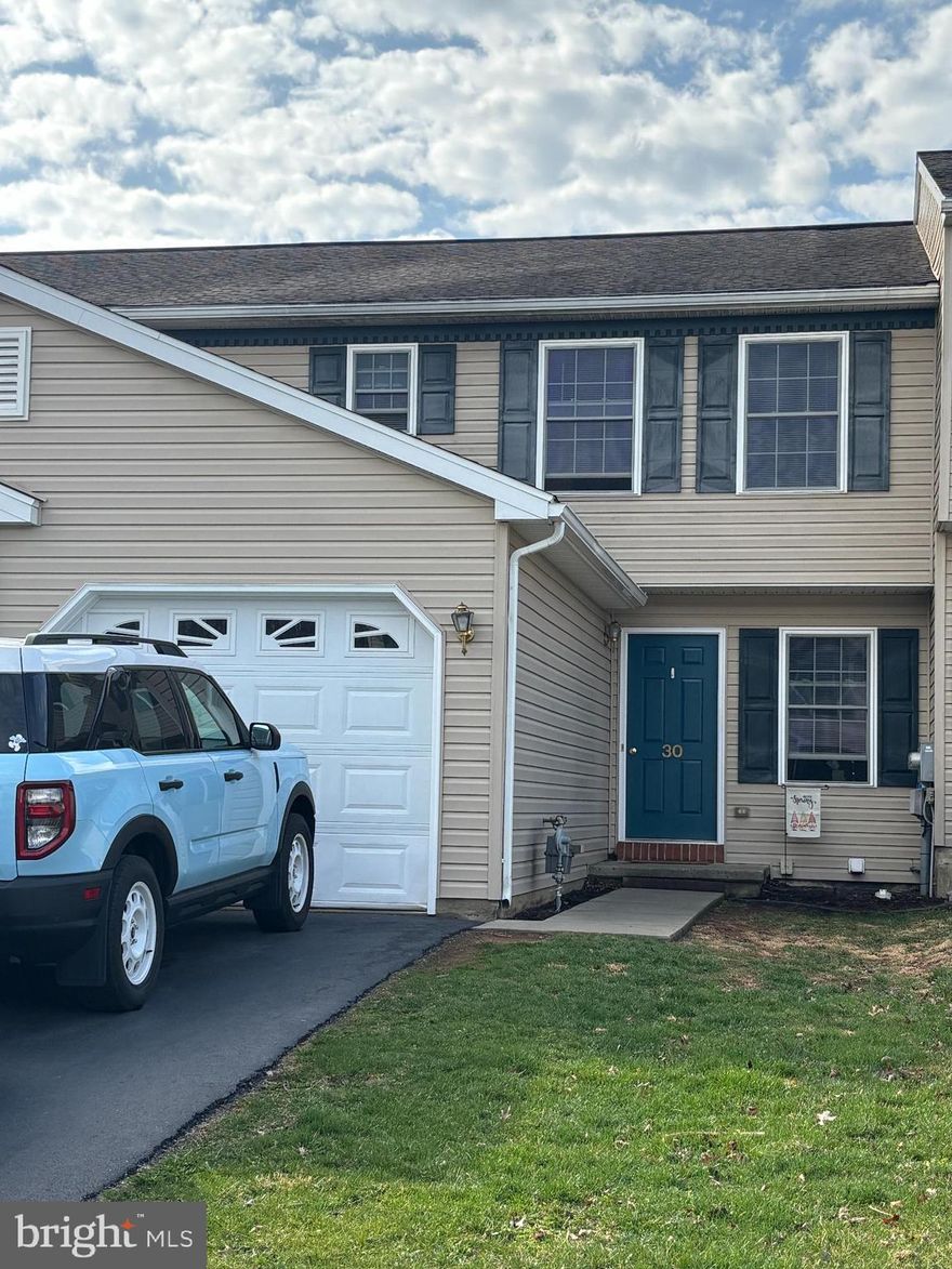 ** Offer has been received; All offers will be presented 3 pm Sunday, April 6 ** Nice 3 bedroom, 1 1/2 bath townhouse in Wheatland Manor on a quiet, scenic perimeter lot overlooking a farm - Nice, spacious rooms. Oversized 1 car attached garage. Full unfinished daylight basement. New hot water heater 5/22. Kitchen, refrigerator, oven/range, dishwasher, washer, dryer included. New composite deck top. Nice, rural type development with all the amenities.