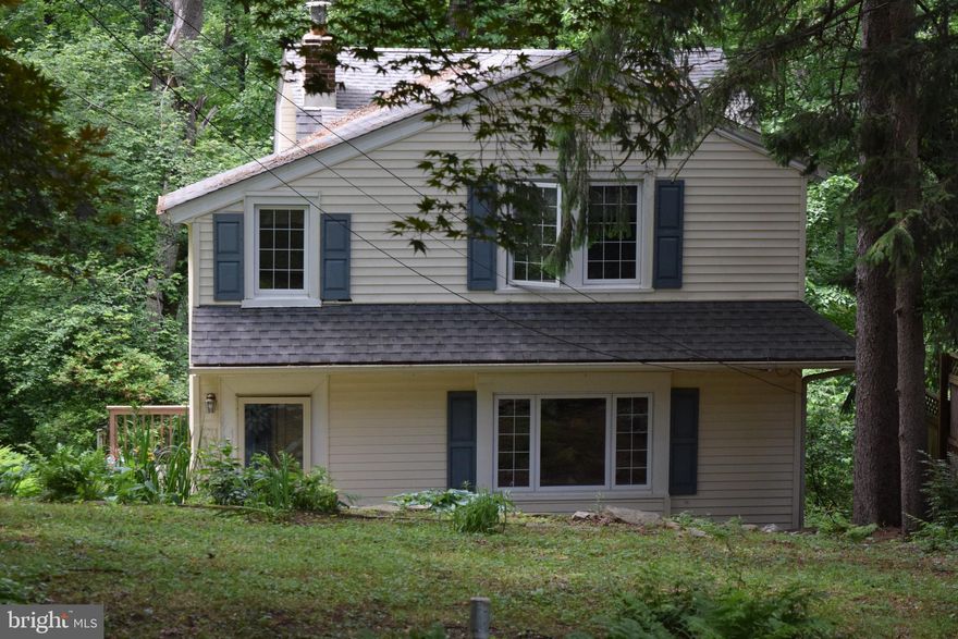 Welcome to your vacation oasis!! The setting of this property is amazing with it’s fabulous views of Mother Nature and all it has to offer. Relax in the morning on your deck with a cup coffe and end your day unwinding with your favorite adult beverage watching all the wild life. The inside will also not disappoint with it’s unique charm & character starting with the foyer that welcomes you in. At that moment you are already in love with all the neat features that very few properties have. The living room has a brick fire place (new liner 5 years ago) with built in shelves on both sides and stain glass window plus 2 new side windows. The dining room has a good size closet and also shares that phenomenal endless view no matter what season. The kitchen has been updated with granite counters, dishwasher, Moravian Tile, newer cabinets, flat top range, micro wave, refrigerator and easy access to the freshly stained deck which adds additional living space where you will spend most of your spare time.  The 2nd floor greets you with the most charming hall daybed suitable for a guest to sleep on. The main bedroom has a  large walk-in closet  & a separate office area . The 2nd bedroom is also of good size. The ceramic hall bath has been updated with new sink vanity and toilet.  A charming arched entrance to the tub is just another neat feature. There are also pull down stairs. The daylight basement has laundry area with laundry tub, a ton of storage and outside access. Some other important features are; inside oil tank, public sewer, boiler about 5 years young, already has a Radon continuous remediation system, updated electrical system. The property has been pre-inspected and report is available. Just about all that was found has been addressed. The location offers a 4 minute drive the the center a Media, a few minutes to the 2 train stations that take you into Philadelphia, near miles of walking trails, close to Ridley Creek State Park & Tyler Arboretum, 20 minutes to Philly International Airport and close to I95 & I476.