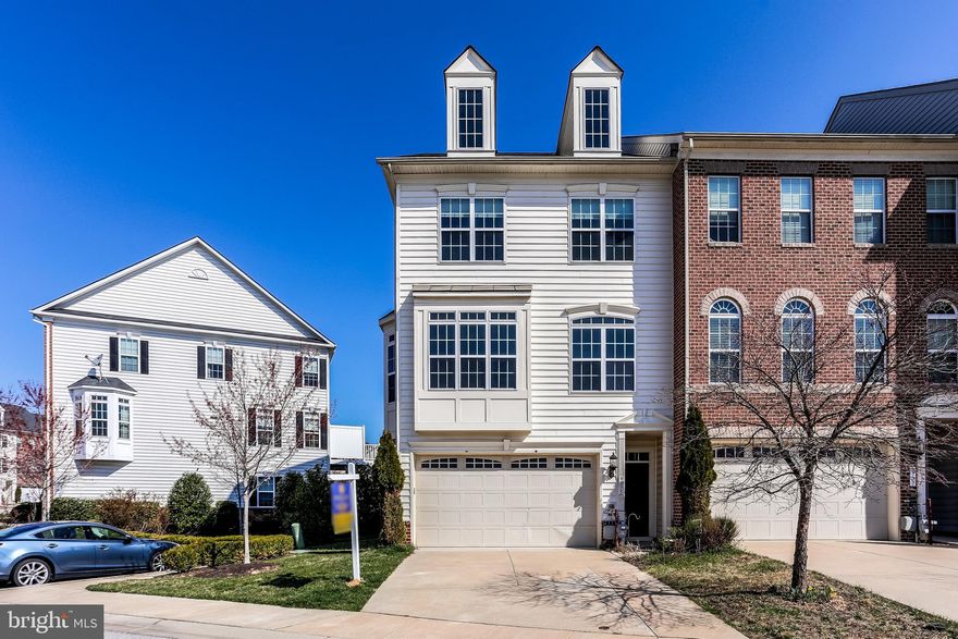 Stunning end of group townhome with over 2600 square feet of finished living space in pristine condition! The main level offers a custom kitchen with granite counter tops, maple cabinets and stainless steel appliances. Gleaming hardwood floors, abundant natural light, built-in sound system , wall mounted TV, powder room and oversized deck with beautiful views make this space hard to leave! The upper level offers a master suite with custom bath plus 2 additional generous sized bedrooms and a full bath. The lower level features a walk-out, fireplace and gorgeous custom full bath. This is a must see!