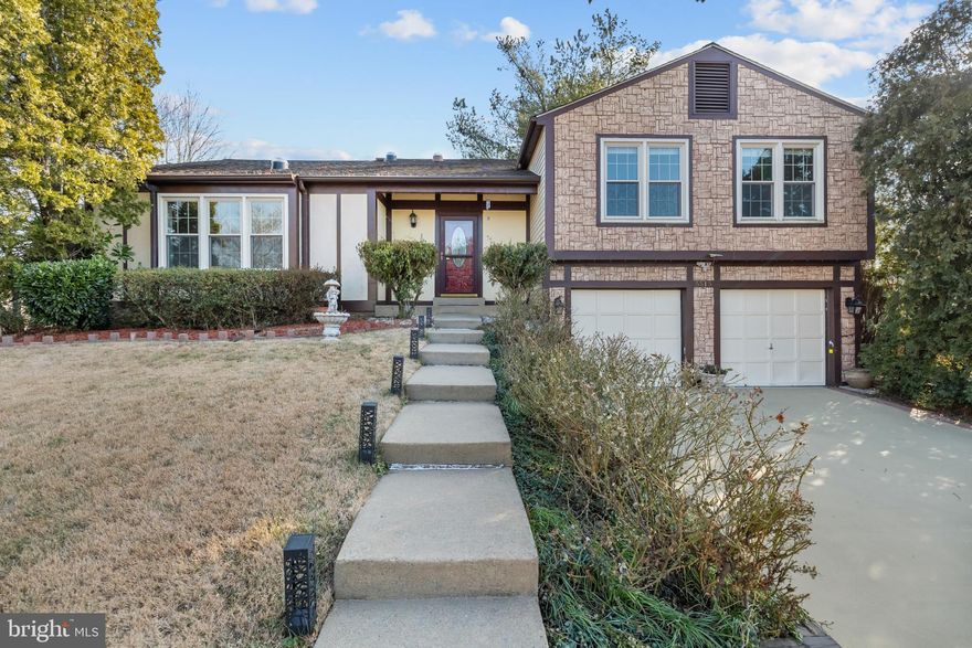 Welcome Home to Belle Pond Farm!
This immaculate 5-bedroom, 3-bath home offers three fully finished levels and 2,472 square feet of beautifully updated living space—great for modern living and entertaining.

Enter into the inviting entry foyer, which flows seamlessly into the formal living room. Just upstairs, you'll find a stunning chef’s kitchen featuring gas cooking, a new stainless steel refrigerator and dishwasher, and an adjacent formal dining area.

The main-level family room boasts a cozy wood-burning fireplace, creating the perfect space to relax. From here, step out onto the deck overlooking your private backyard—ideal for outdoor dining or enjoying your morning coffee.

Retreat to the primary suite, complete with a private en-suite bath and dual vanities. The upper level is enhanced with brand-new luxury vinyl plank (LVP) flooring throughout the bedrooms, kitchen, and family room.

The fully finished lower level offers two additional bedrooms, a spacious recreation room, and a full bath—with access to the covered porch, perfect for guests or multigenerational living.

Natural light abounds throughout the home, thanks to four solar tubes strategically placed to brighten the interior. Additional updates include:

Fresh paint throughout

New garage door openers with Wi-Fi capabilities

Beautifully landscaped, large corner lot

Prime Location!
Just 1.5 miles from Giant, Costco, Walmart, Target, Wegmans, Aldi, Lidl, Lotte, and countless dining options—from restaurants to fast food.
Only 2 miles to Lowe’s and Home Depot, 3 miles to Fair Oaks Hospital and Mall, and just 20 minutes to Dulles International Airport.
Commuting is a breeze with easy access to I-66, Route 50, Route 28, and Route 29.

Don’t miss your chance to own this move-in ready gem in a truly unbeatable location!