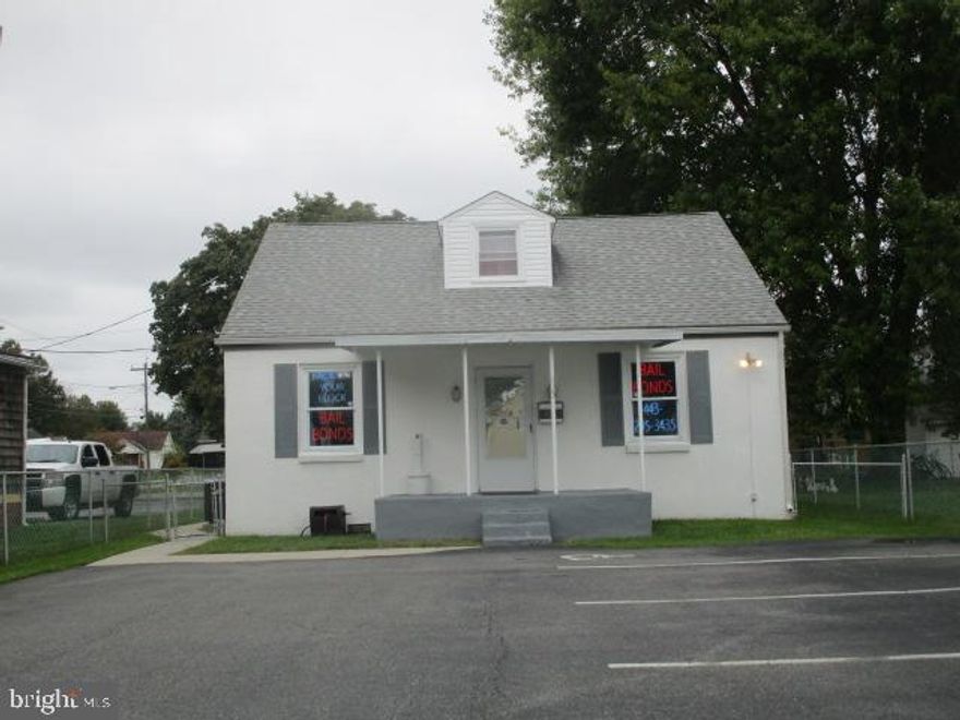 Multiple Use Options in Elkton! Current Use is Bail Bondsman Office - The Possibilities Are Many - Office, Beauty Salon, Barber, Medical OR Residential! It Has 2 Bedrooms and 2 Bathrooms and Is Move-In Ready for you. Updates include: Recessed lighting, hardwood floors, central air conditioning, brick accent wall, roof and security system. Also features a front porch, new concrete walks and concrete rear patio, with a fenced yard. Zoned RO Residential-Office, this property offers a variety of uses and is turn key with seven parking spaces (one is handicap). Great opportunity for an in-home office, or residence in great condition at an affordable price. Only $225,000.  Call for private tour today.