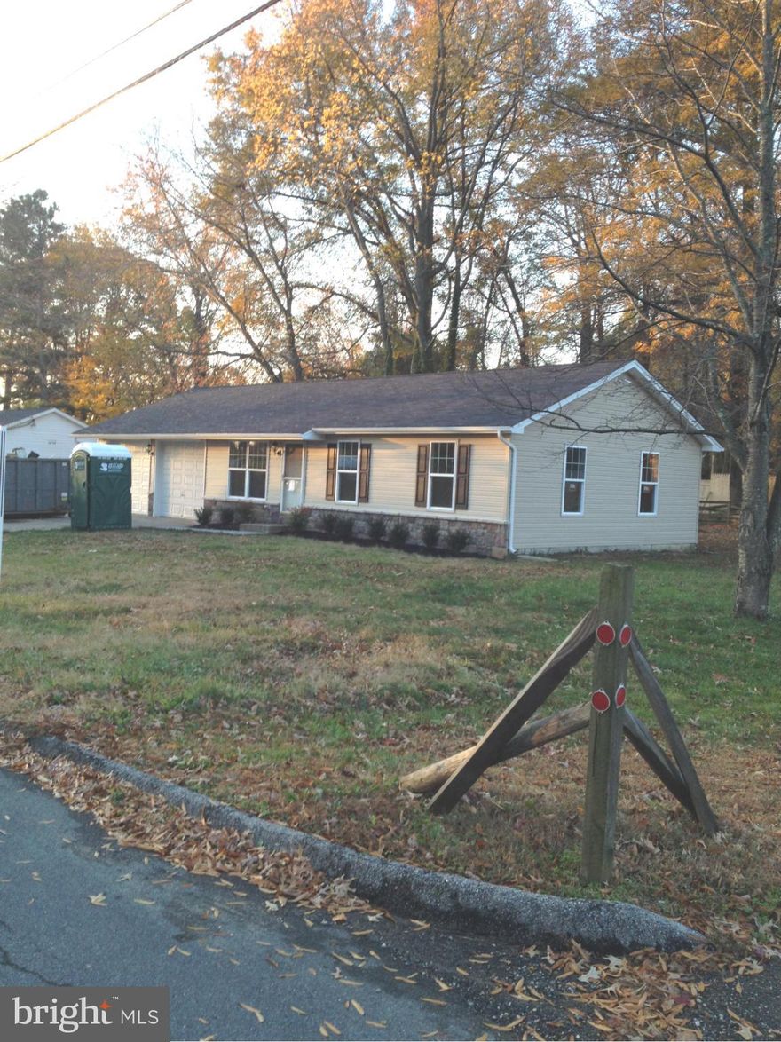 Wow!  Fully remodeled rancher with 2-car insulated garage, great schools, level nice treed yard, just about everything is new in this home but the framing and foundation.  Perfect home for a 2 car family, or maybe a Harley or Seadoo storage area. The home next door was remodeled by the same builder last year Herzog Homes, LLC.  All permits and inspections.  HURRY!!! completion soon!