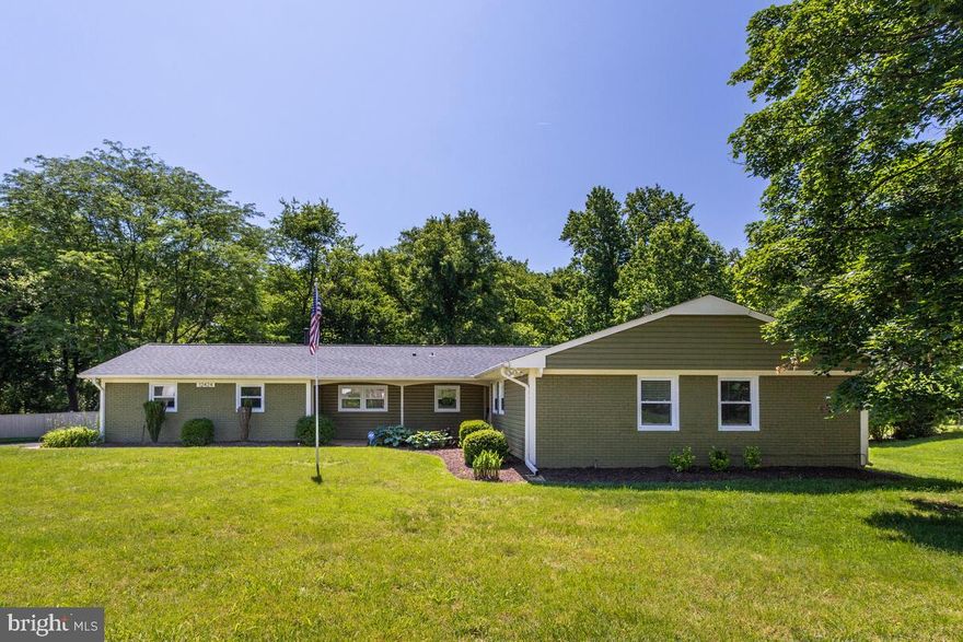 This beautifully maintained 3 bed / 2 Bath open concept rambler is located on a highly sought after corner lot that backs to a wooded area. You will find a HUGE fenced back yard with an enclosed patio area, also boasts a shed with electric. Kitchen done up with tasteful gray and white marble counter tops coupled with Stainless steel appliances.  This property is ready for entertaining inside and out! Natural light is plentiful in this home. Loads of laundry room space with storage and a wash sink as well. Bathrooms are updated. NO HOA! The bond for the Whitehall pool club can be purchased for swimming pool membership. Extensive, healthy landscaping along with a two car garage and parking for an additional 5 vehicles. Welcome HOME!