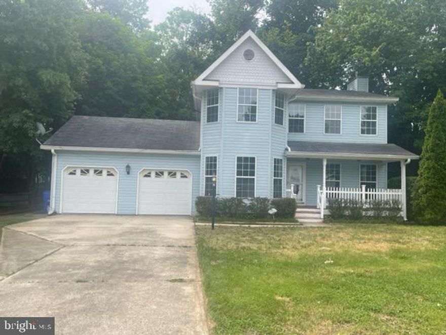 This one will not last. Located at the end of the court on a beautiful private lot. Large Primary bedroom with sitting room and a full bath. Updated tile in baths. Livingroom with  wood burning fireplace. New carpet in bedrooms. Hardwoods on main level. Large eat in kitchen. Nice deck overlooking great lot. 2 car garage. Fresh paint throughout.