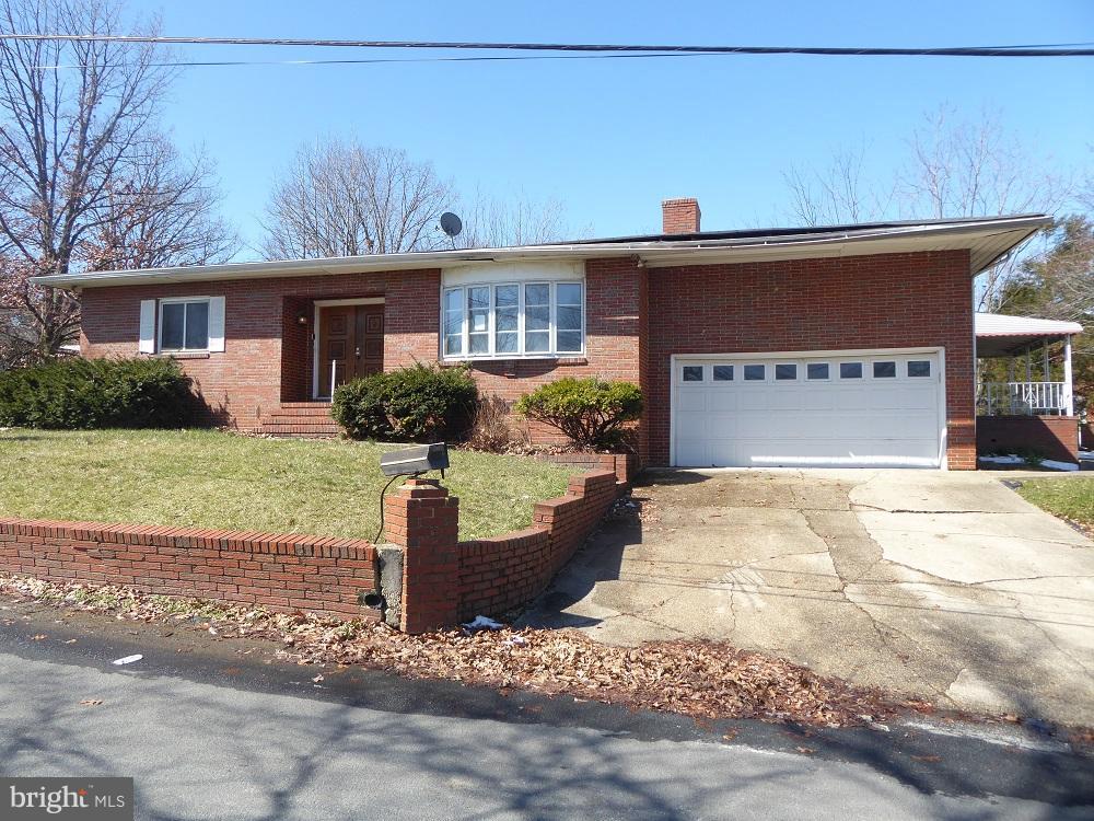 This is a Fannie Mae Reverse Mortgage Foreclosure. Brick rancher with covered side porch and one car garage. The main level has mostly hardwood flooring. The main level offers three bedrooms, two full baths, large kitchen, separate dining room, living room with stone fireplace, family room and covered side porch. The basement has a second fireplace, full bath and room to make your masterpiece.