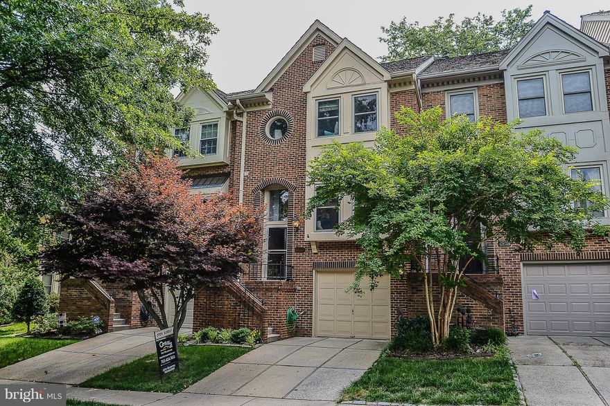 Spacious all brick garage townhouse is waiting for your pickiest buyer! Space, space and more Space.  gourmet kitchen,granite,ss appliance,  hardwood floors,Dishwasher,Double oven,dryer (2015) Fridge (2013) Hot water heater (2014) Deck was sealed (2016). Dining room with FP.  Sunroom w/skylights.: pool, fitness cent, golf, tennis and BB courts - Must See -