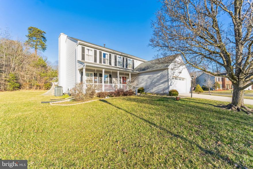 Welcome Home!  Inviting front porch leads you into the elegant 2 story foyer.  Beautiful hardwood floors guide you through this lovely home.  Features include formal living room, separate dining room, spacious kitchen with breakfast area overlooking cozy family room with fireplace.  On to the upper level which features primary bedroom with full bath and 2 walk in closets, 3 other generous sized bedrooms and a full hall bath.  Use your imagination in the unfinished but very spacious lower level.  Large serene backyard is perfect for entertaining or just simply relaxing.   Great community amenities.  Close to shopping, restaurants, transportation and more.  Easy access to major routes.  Sold "as is".