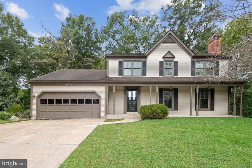 Get back to nature when you move into this lovely Montpelier Woods colonial located on a beautifully landscaped .45 acre cul de sac lot backing into woods. The main level features crown molding throughout & gleaming hardwood flooring from the formal entry foyer through the living room w/wood burning fireplace into the expansive eat-in kitchen w/island/breakfast bar w/bar stools, all white cabinetry w/built-in dishwasher, marble counter tops, stainless appliances including a French door refrigerator, a propane gas range & a microwave in the island, built-in wall cabinetry on either end of sliding door pantry & Pella slider to deck. The hardwood foyer also extends down the hall to the family room with a wall of custom Pella windows.  The oversized laundry/mud room features built-in oak cabinetry and a corner table w/bookcase & custom window which could be a computer space or small office area.  The upper level features a primary bedroom w/walk-in closet & a primary bath.  There are also three additional bedrooms & a 2nd full bath on the upper level. The finished walkout level basement features an L shaped recreation room w/a full wall of shelving & mirrored sliding doors and a 2nd Pella slider exit to the rear yard.  There is also a storage room w/built- in shelving and a utility room on the lower level.  The L shaped deck overlooks the incredible landscaping below, complete with fish pond, water fountain & benches in park like setting to take time to enjoy the sights and sounds around you.  At the other end of the deck is a covered gazebo with a gas grill for your outdoor dining & entertaining. New Carrier 15 Seer HVAC System 7/23, Pella Windows throughout & neutral décor w/freshly painted interior '17. Nature lovers, this one is for you!