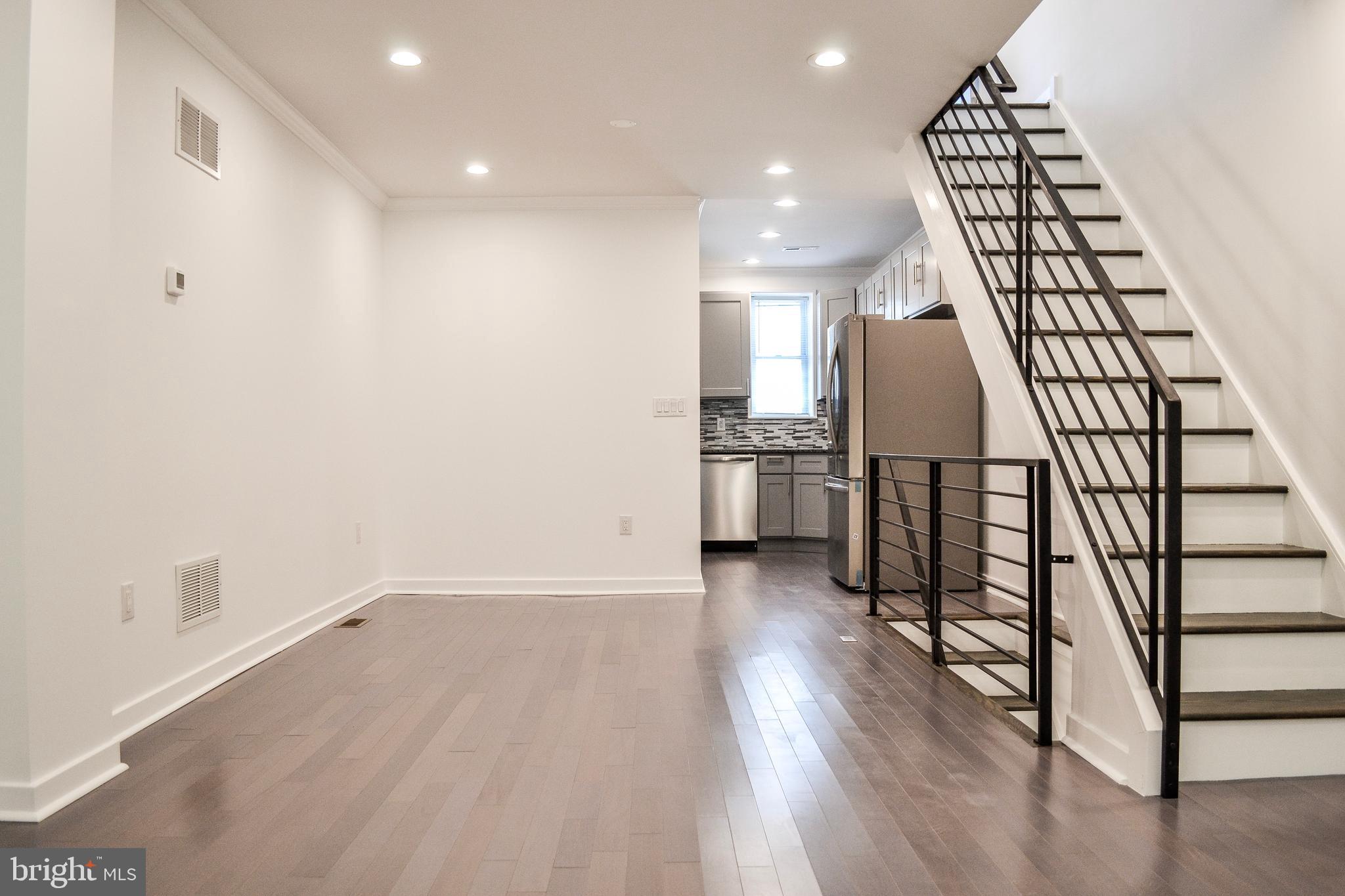 Welcome to 1406 S 28th St! This beautiful home was newly renovated from top to bottom, with special attention being paid to detail.
Inside you'll find a modern and stylish living space with high-end finishes and amenities. Enter into the spacious living room where you will notice the gorgeous new hardwood floors along with an immense amount of natural light! The interior also features modern lightning along with an open concept layout. Walk through the living room to enter into a kitchen that features custom cabinetry with granite countertops, top-of-the-line stainless steel appliances, and a custom tile backsplash!
Step outside, and check out the fenced-in backyard which is perfect for having your morning cup of coffee or for hosting BBQs with friends and family. Back inside on the second floor, you'll find three sunny and bright bedrooms with ample closet space as well as a full bathroom with a huge sink, storage space, and custom tiling.
Still need more space? Check out the fully finished basement which features another full bathroom along with enough space that can easily be turned into a family room, home office, or even an additional bedroom! Additionally, with its convenient location near University City and Center City Philadelphia, you'll have easy access to all the best shopping, dining, and entertainment options that the city has to offer. Don't miss your opportunity and schedule an appointment to check out 1406 S 28th St today!