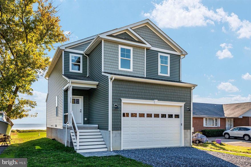 Hard to find - Waterfront Brand New Construction!!!  SANDY BEACH!!!  Amazing water views!!!  Composite deck to be installed!  Come see this gorgeous new home with lots of upgrades and lots to offer!  True 3/4" hardwood floors! Hardwood staircase with steel handrails and stainless steel cable for a modern feel.  Kitchen features Quartz countertops, upgraded tile backsplash, and walk in pantry!  Master suite has incredible water views!  Watch the sun rise from your master bedroom window or while you get out of your morning shower!  Hardwood floors run through the 2nd floor hallway and master bedroom.  LED light fixtures, air seal, and more, make for an energy efficient home!  Upgraded carpet in additional two bedrooms.  Spacious storage in the crawlspace.   Pier Permit in Hand from MDE!

Update 4/17/23:  Use and Occupancy Permit is in hand!!!  House is complete except for deck!  Quick Delivery available!