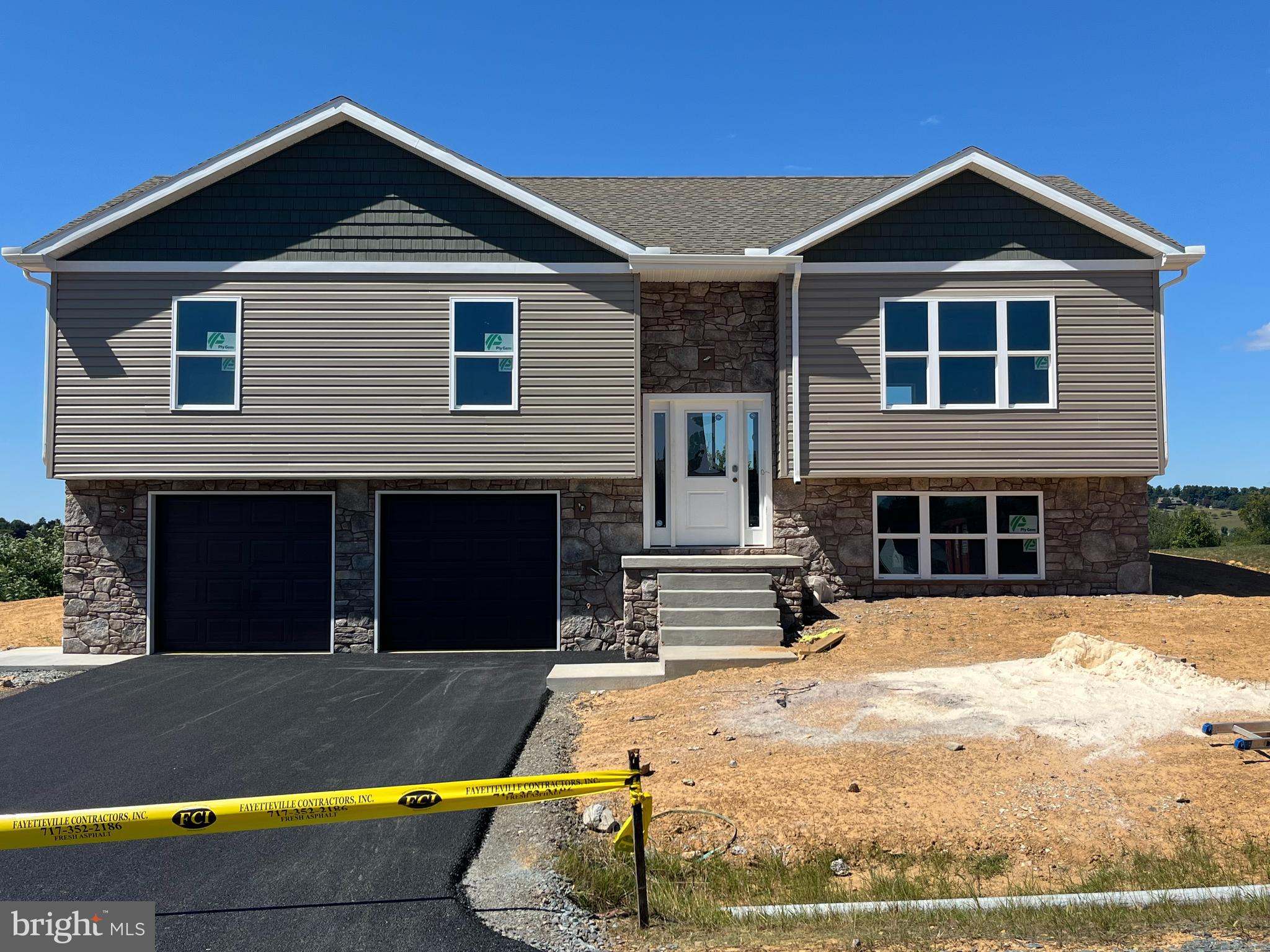 Welcome to Antietam Commons! Ashlynn Homes is offering a split foyer on Lot68. House is currently under construction, and are slated to be finished 10/31/25 . Prices start at $389,900. The renderings show the exterior colors, and the Interior photos are of a similar house. Each home features an open concept kitchen (island included), dining, and living room areas. All Kitchen appliances included. Granite Countertops, LVP flooring through out, except for the bedrooms, which will have carpet. The master bedroom features its own private bath, along with a closet. Full Poured concrete foundation. Central A/C and Electric Heatpump, and a 12x12 deck off the rear. The lower level family room/ bedroom area, and 1/2 bath will be finished at the list price. Call today to find out more about this new construction single family home!