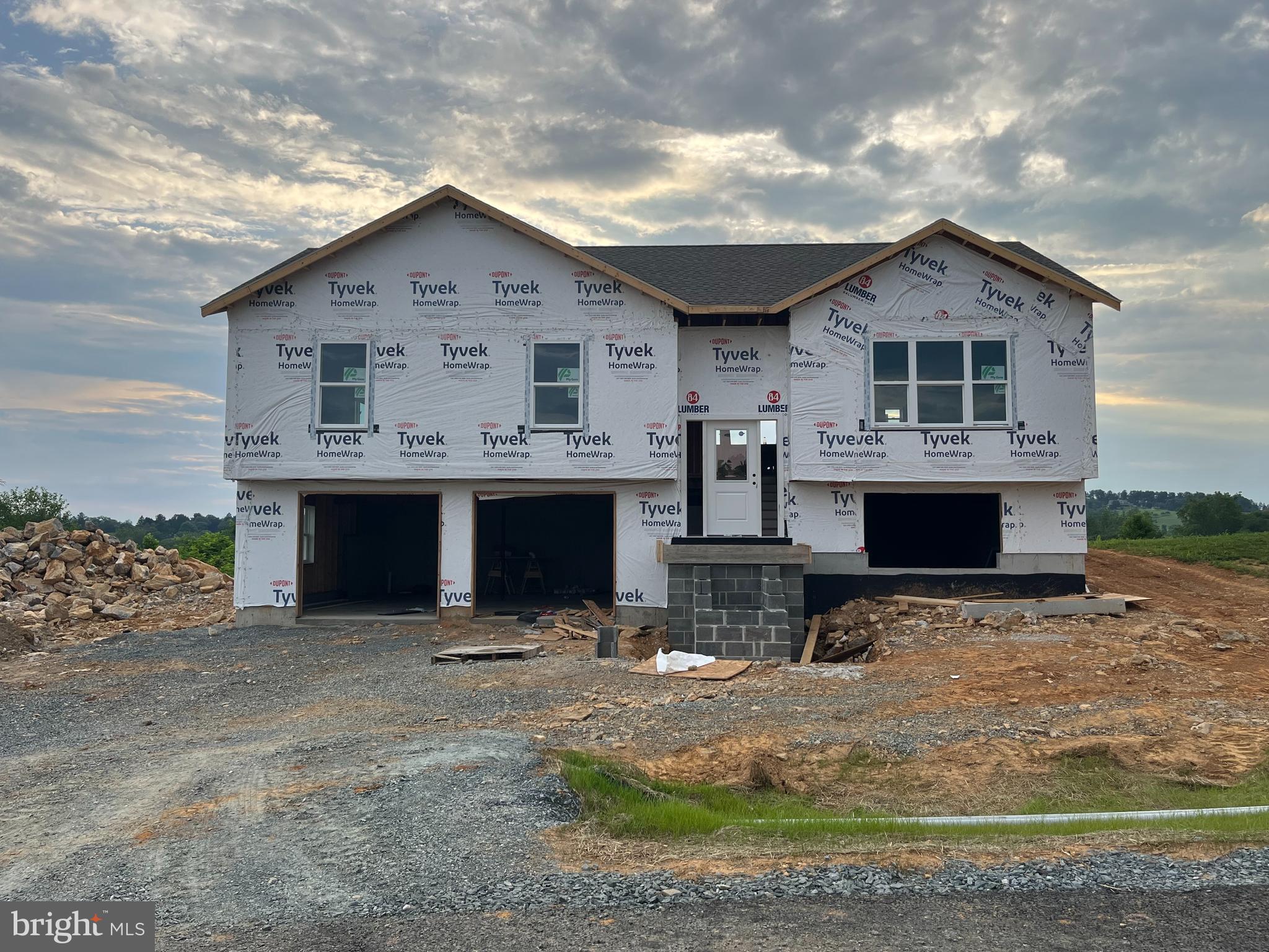Welcome to Antietam Commons! Ashlynn Homes is offering a split foyer on Lot68. House is currently under construction, and are slated to be finished 8/31/25 . Prices start at $389,900. The renderings show the exterior colors, and the Interior photos are of a similar house. Each home features an open concept kitchen (island included), dining, and living room areas. All Kitchen appliances included. Granite Countertops, LVP flooring through out, except for the bedrooms, which will have carpet. The master bedroom features its own private bath, along with a closet. Full Poured concrete foundation. Central A/C and Electric Heatpump, and a 12x12 deck off the rear. The lower level family room/ bedroom area, and 1/2 bath will be finished at the list price. Call today to find out more about this new construction single family home!