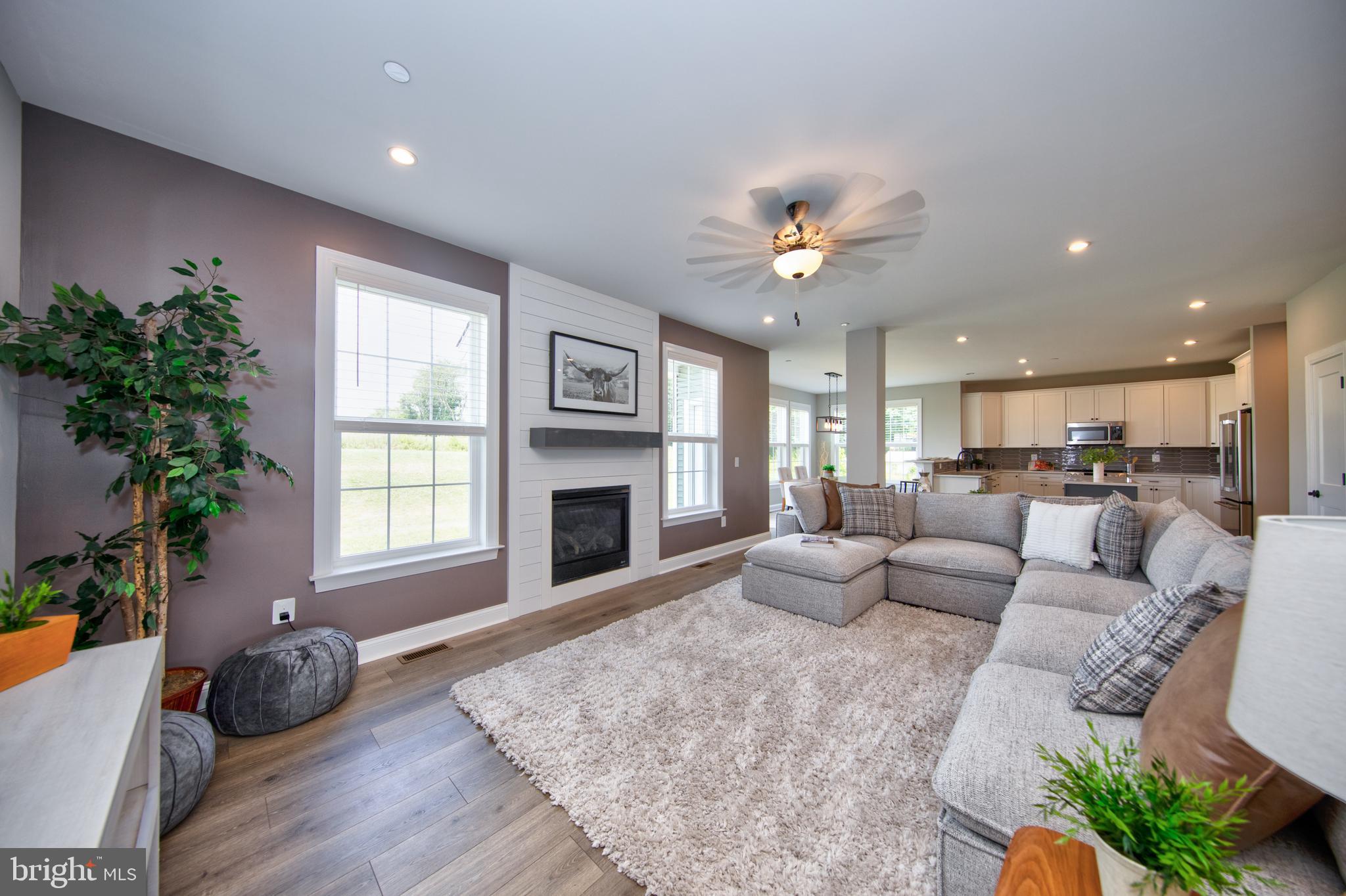 FALLSTON SCHOOLS! Alison's Ridge is the perfect blend of Privacy, Prestige and Community in an intimate cul-de-sac enclave of only SEVEN custom homesites. This Beautiful New Home is MOVE IN READY! Multi-Generational Living: TWO-STORY entrance, Separate Dining Room, Family Room with gas FP & Shiplap, Mudroom with Bench/Storage and FIRST FLOOR PRIMARY SUITE /FLEX SPACE/OFFICE with glass pocket doors & Full Bath. The Chef's Kitchen includes an EXTENDED Quartz Center Island, Tile Backsplash and an Abundance of Cabinets & Food Prep Space and a Morning Room Perfect for Additional Dining & Entertaining. The Upper Level features ANOTHER PRIMARY SUITE with Luxury En Suite Bath featuring Soaking Tub, Walk-in Shower, Double Vanity, THREE Walk In Closets, Cathedral Ceilings and a sitting area perfect for crawling up to a good book. Extra Living Area/LOFT/ FLEX SPACE that can serve as a Teen Space, Another Office Space, Living Area, Art Studio and so much more! Three Additional Bedrooms with Full Hall Bath featuring Dual Vanity and Convenient Upper-Level Laundry (WASHER & DRYER) too. Over 3100 Square Feet of Above Grade Living Space! ASK ABOUT the $10,000 builder incentive towards closing costs with preferred title company!1 YEAR HOME WARRANTY included! Where you will enjoy the views-especially at sunset!