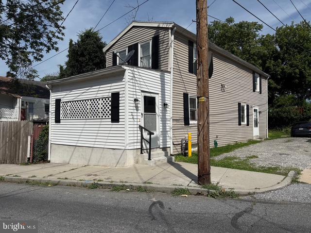 This charming detached home in York City offers an abundance of natural sunlight throughout its interior and features three comfortable bedrooms, making it ideal for homeowners or investors alike. The property includes convenient off-street parking and a small yard perfect for easy maintenance or outdoor enjoyment. Currently tenant-occupied on a month-to-month lease, the home generates $15,000 annually in rental income, with potential for increased returns. Whether you're looking for a residence or a smart investment, this well-located property offers flexibility and opportunity.