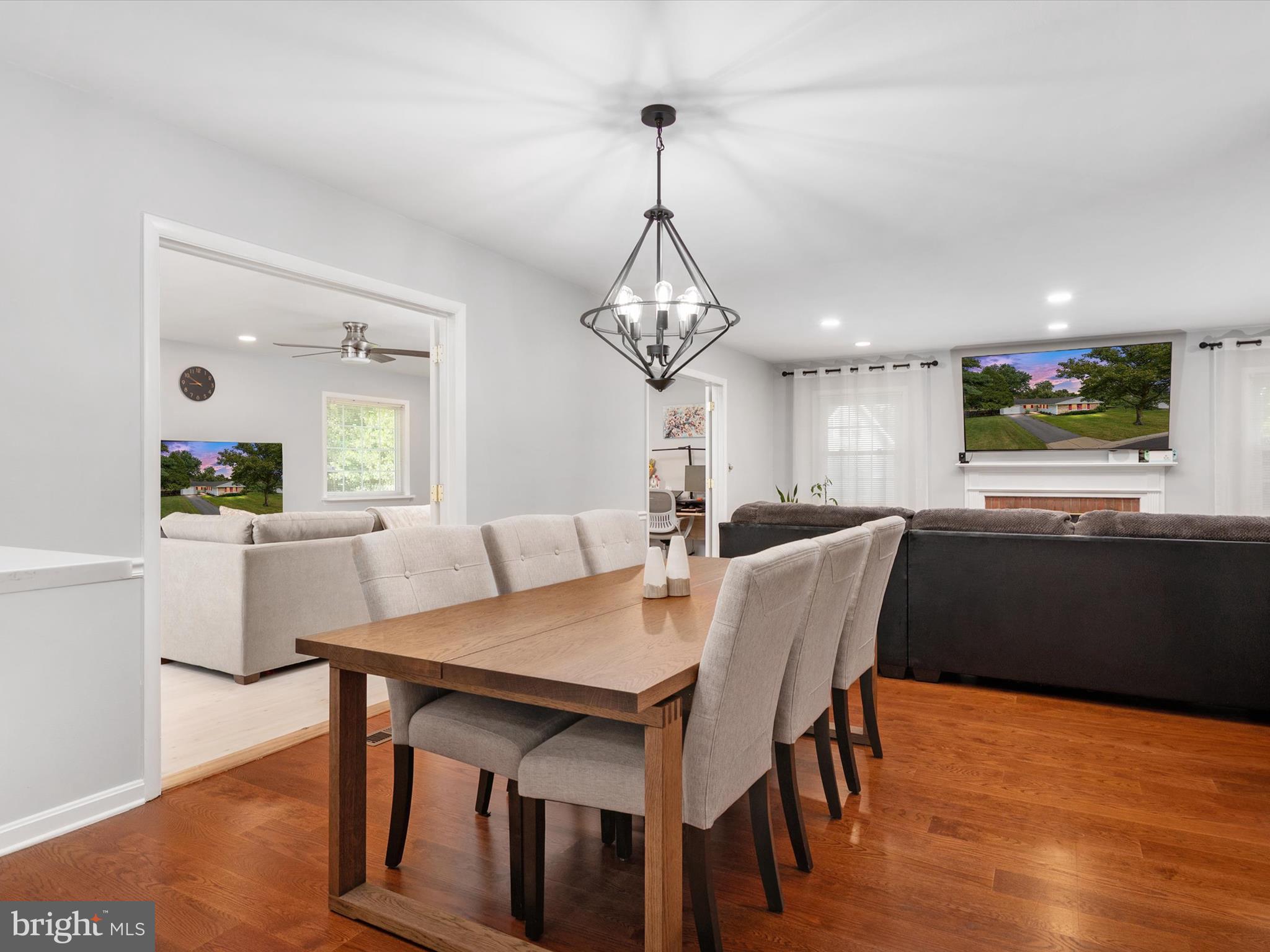Beautifully renovated and expanded Buckingham Rancher, ideally situated in the sought-after Whitehall at Belair community. This thoughtfully updated single-level home offers nearly 2,000 square feet of well-designed living space. The recently remodeled kitchen features modern white shaker-style cabinetry, Quartz countertops, stainless steel appliances, a stylish tile backsplash, ceramic tile flooring, and a peninsula island with bar seating, perfectly flowing into the inviting living room complete with a brick fireplace and recessed lighting. A standout feature of this home is the spacious rear addition, which elevates it beyond the typical Levitt rancher. Enhanced with French doors, recessed lighting, a contemporary ceiling fan, and abundant natural light, this versatile space is ideal for a recreation room, home office, or playroom. All bedrooms are equipped with ceiling fans, and both bathrooms have been tastefully renovated with updated vanities and tiled flooring. Step outside to enjoy a generous rear deck, perfect for outdoor entertaining and relaxation.
Conveniently located near local schools, Bowie Plaza Shopping Center, and the Whitehall Pool and Tennis Club (membership optional), this home also provides easy access to the Bowie Golf Club, a variety of dining options, public transit, and major commuter routes including Routes 50, 301, 450, and the Capital Beltway.