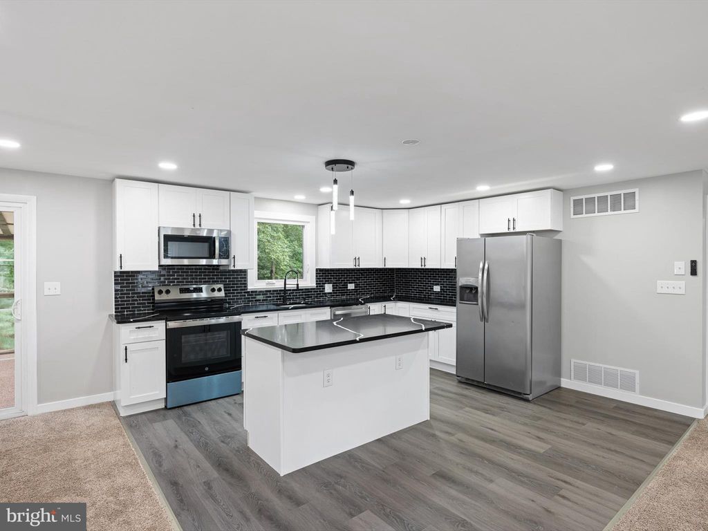 Photo of 22832 Angola Road E, LEWES, DE 19958 (MLS # DESU2100050)