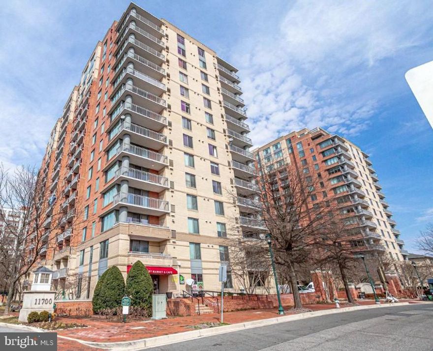 The Gallery at White Flint is a gorgeous building with incredible amenities in PRIME location 1 -2 block walk to METRO and Pike and Rose Shops, grocery stores, restaurants. You don't need a car to live here.  Spacious floor plan with laminate flooring, washer and dryer in unit,  Kitchen has cut through open to living room, balcony.  The building has locked main entry, gorgeous lobby and common area, meeting/business center rooms and lounge/entertaining rooms, incredible fitness gym.  1  ASSIGNED GARAGE space  ** Smaller Dogs allowed case by case with $50 additional rent. ** We have an in-house Maint Dept for QUICK repair response/ 24 hrs emergency.  * AGENTS read the Agent Private remarks in BRIGHT MLS please !!! APPLY on our website under Avail Rental/Apply Now. ALL ADULTS must fill out an APP, you will be asked to upload a paystub and copy of drivers license in the app, so best to have those ready on desktop before applying. App processing take 3 business days +-.  $400 move in fee payable to The Gallery