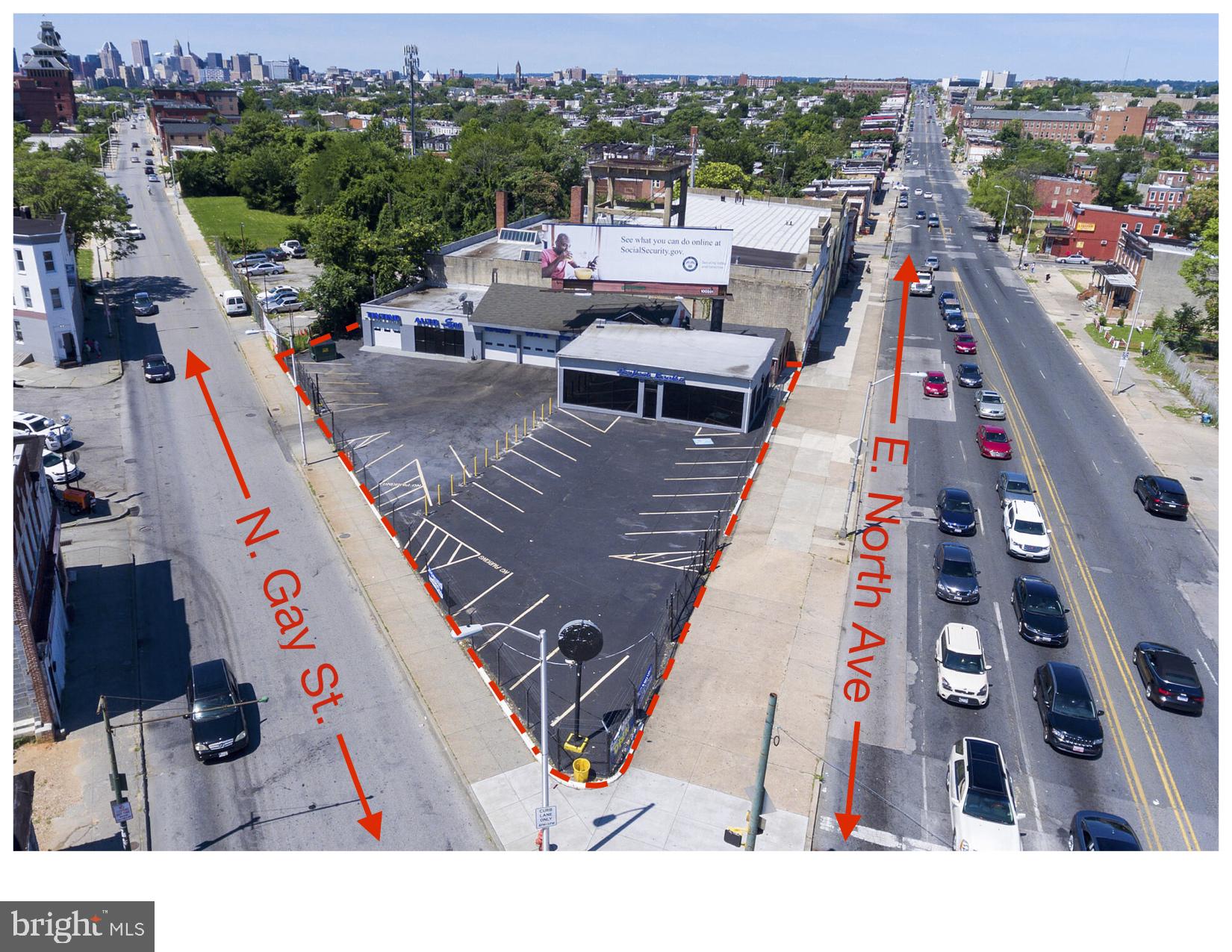 Incredibly busy Retail / Automotive corner property in Baltimore City! This property has over 190 feet on E. North Avenue and 193 feet on N. Gay St. Outstanding visibility!! This property also features 4 drive in doors (w/ Openers), 4 recently renovated bathrooms, a fenced-in 27 space parking lot, Floor to ceiling windows. Property has great potential and many uses! Billboard on property is leased and receives income! Immediate availability! Property is located within A Baltimore Opportunity Zone and A Baltimore Enterprise Zone. This makes it eligible for possible tax credits!