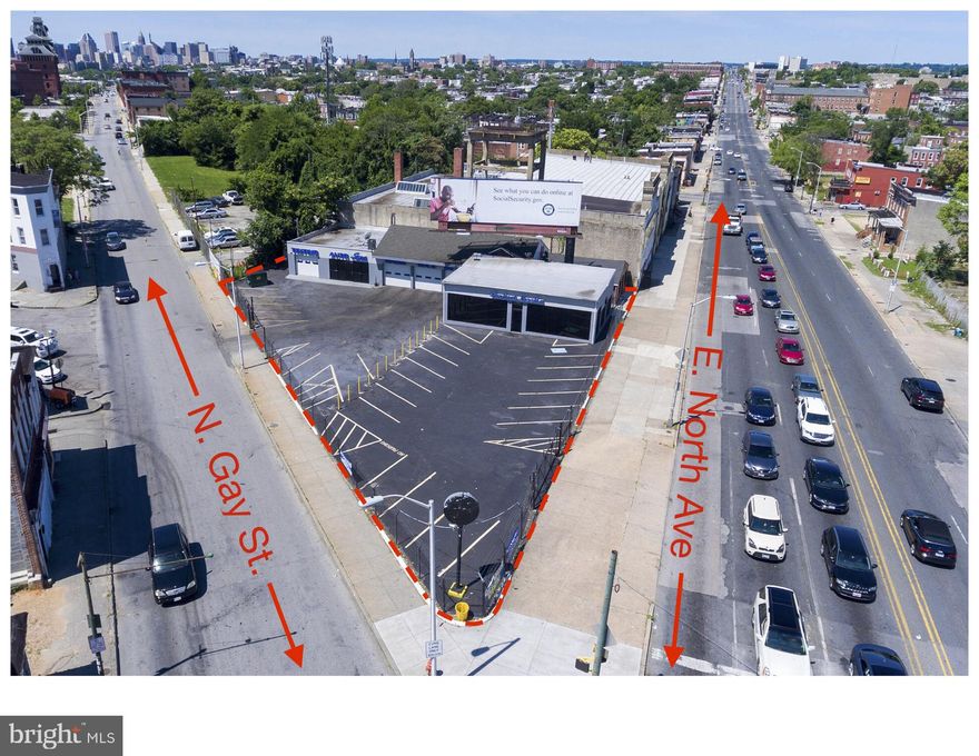 Incredibly busy Retail / Automotive corner property in Baltimore City! This property has over 190 feet on E. North Avenue and 193 feet on N. Gay St. Outstanding visibility!! This property also features 4 drive in doors (w/ Openers), 4 recently renovated bathrooms, a fenced-in 27 space parking lot, Floor to ceiling windows.  Property has great potential and many uses! Billboard on property is leased and receives income!  Immediate availability!  Property is located within A Baltimore Opportunity Zone and A Baltimore Enterprise Zone. This makes it eligible for possible tax credits!