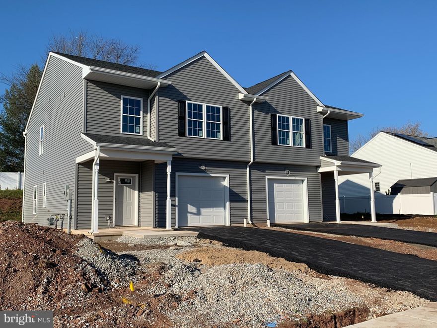 If you think all duplex style homes are created equal.....guess again. This home was custom built by J. Hartley Construction and the workmanship speaks for itself. Great open layout with wide foyer as you enter from the one car garage with powder room leading to a large eat in kitchen, dining area and living room in the back of the home. Light gray cabinets, black granite, stainless steel appliances and luxury vinyl tile wood floors will complete this beautiful home. Another spacious landing a the top of the stairs gives many options. Three spacious bedrooms, 2 full baths and a 2nd floor laundry! This home has it all. Close to conveniences & schools.  Lawn & snow removal are covered in the HOA. Don't wait. This charming home will be completed by the end of the year but, call it yours today!