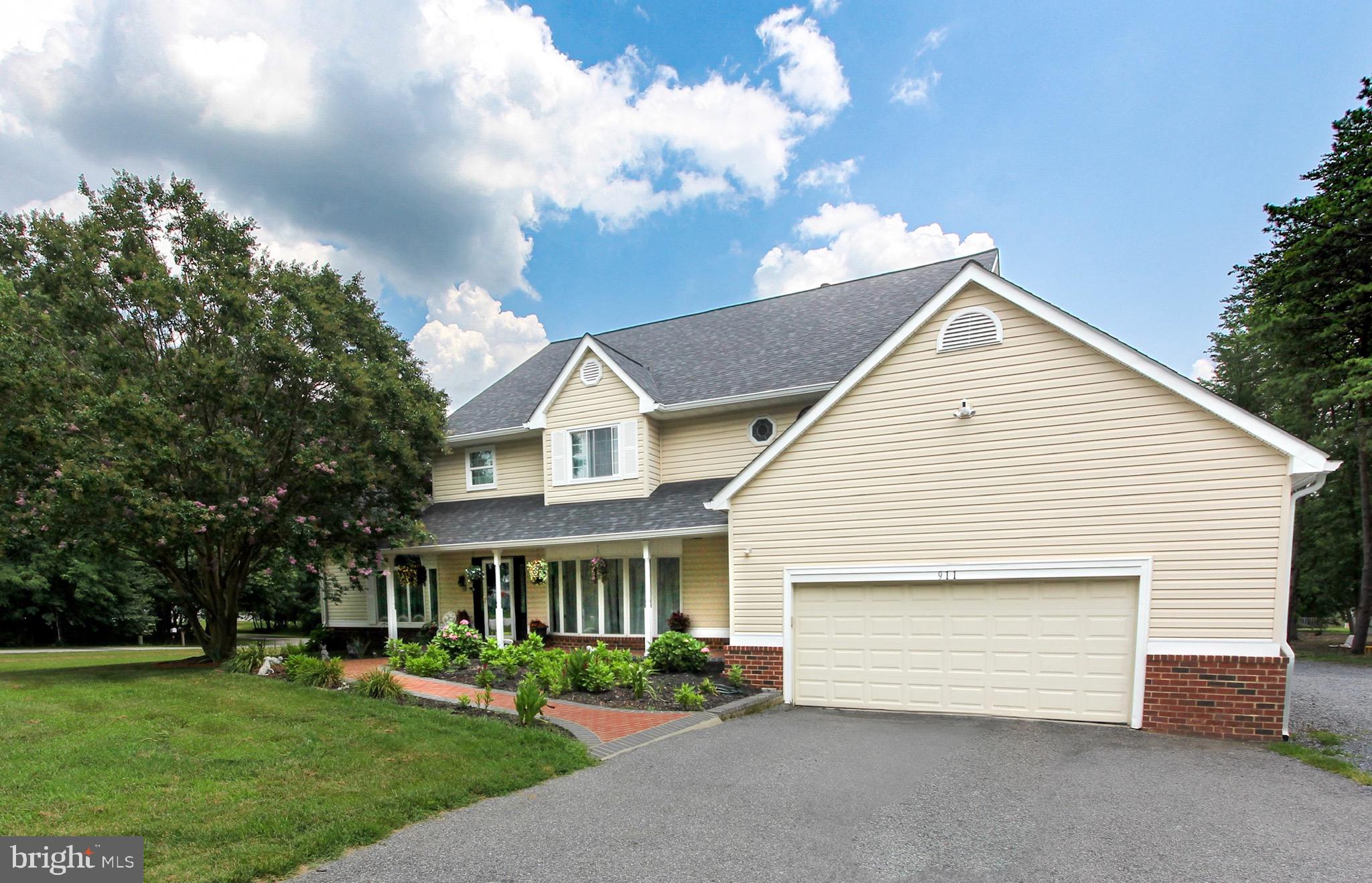 Fall in Love with This Fully Upgraded Home on 1.6 Acres!
Step into this bright, spacious 3-level, 5-bedroom, 2.5-bath single-family home with an attached 2-car garage, perfectly positioned on a prime 1.6-acre corner lot in a quiet neighborhood. Move-in ready with fresh paint, brand-new roof, new windows, and a modern water system — everything feels fresh, updated, and ready for you!
Enjoy the inviting front porch, ideal for relaxing on warm days. Inside, you'll find gleaming hardwood floors and a soaring 2-story family room filled with natural light — perfect for gatherings and entertaining.
The fully remodeled eat-in kitchen is a showstopper, featuring brand-new stainless steel appliances, custom 42” cabinetry, granite countertops, sleek glass backsplash, and a large center island. A separate dining room, home office, spacious living room, main-level laundry, and powder room complete the main floor.
Step outside to a new, maintenance-free deck overlooking a huge, private flat backyard — ideal for grilling, outdoor fun, and hosting friends and family.
Upstairs, the expansive primary suite offers a large walk-in closet and spa-like bath with dual vanities and a jetted soaking tub. Four additional bedrooms and a full bath complete the upper level.
The unfinished walkout basement is ready for your personal touch — whether it's a home gym, rec room, or extra living space.
Additional highlights:
✅ New Roof
✅ New Windows
✅ New Water System
✅ Spacious 2-Car Garage + Ample Driveway Parking
✅ No HOA Fees
✅ Prime Location near Rt 100 for Easy Commuting
Don’t Miss Out — This Beautiful, Fully Upgraded Home Won’t Last Long! Schedule Your Showing Today!