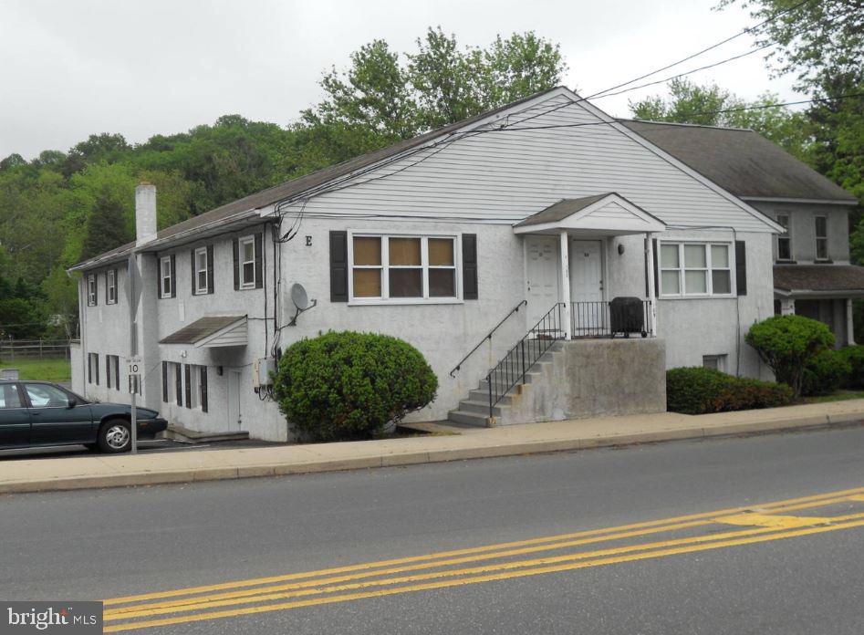 Investment opportunity featuring 5 parcels with two buildings. The first building boasts 7 fully renovated units, including 6 spacious 2-bedroom units and 1 cozy 1-bedroom unit, along with 6,000 square feet of parking space. Adjacent to this is a duplex with a 3-bedroom unit on the second floor and a 1-bedroom unit on the first floor. Additionally, there are 3 extra parcels: one paved lot currently leased to a commercial contractor, and two open spaces.
These properties offer access to the scenic Perkiomen Valley Trails, creeks, fishing spots, and more, providing a peaceful, nature-filled environment for tenants. Each unit’s tenants are responsible for their own hot water and electricity, while a laundry facility on-site presents potential for additional income with a simple update to a pay-per-use system. All tenants are on month-to-month leases, providing flexibility and the potential for increased rents.
Located in Green Lane Borough, part of the thriving Perkiomen Valley in Montgomery County, these properties are positioned in an up-and-coming area with growing local municipalities. The rear of the open space lots offers tranquil creek access for ultimate relaxation. Don’t miss the chance to add this prime investment property to your portfolio today!
