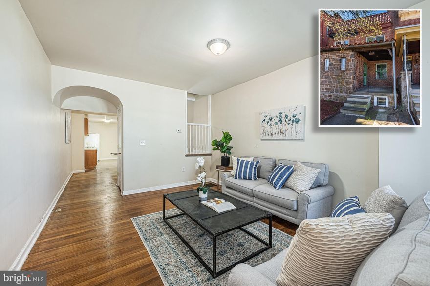 MOVE IN READY PORCH FRONT ROWHOME IN RESERVOIR HILL WITH OVER 1,600 SQ. FT. OF LIVING SPACE & GARAGE PARKING!  Features include a spacious living room and separate dining area with hardwood flooring, a galley kitchen with tons of cabinet space, upper level with 3 generously sized bedrooms, a full bath, and a rear covered porch, a full basement that is perfect for storage or finish to add more living space, and a rear 1 car garage with additional driveway parking!  Minutes from 83 and convenient to Druid Hill Park with amenities including the Baltimore Zoo, Druid Park Pool, Rawlings Conservatory, Disc Golf, and more!