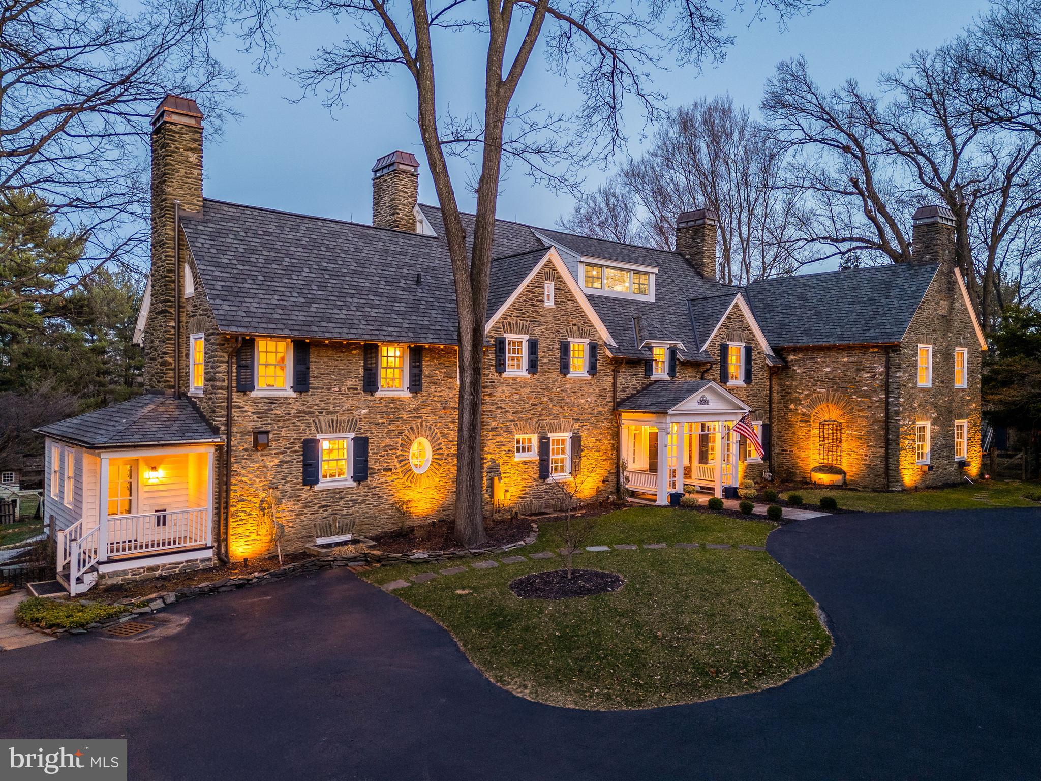 Welcome to 710 Weadley Road, a distinguished Main Line estate where historic charm meets contemporary elegance. Nestled on a picturesque and private lot in Tredyffrin Township, this completely reimagined home seamlessly blends classic architecture with modern sophistication.
Inside, a series of warm and inviting spaces unfold—each thoughtfully designed with curated finishes and exquisite detail. The expansive kitchen is a showstopper, boasting chef-grade appliances, timeless cabinetry, and a statement island that anchors the room. Entertain effortlessly across multiple dining and living areas, including a moody, custom bourbon library and a jaw-dropping formal dining room with a decorative fireplace and butler’s pantry.
Upstairs, the luxurious primary suite offers a serene retreat with vibrant custom drapery, dual walk-in closets, and an elegant decorative fireplace as a striking architectural centerpiece. The spa-like bath is finished in marble tile, brass fixtures, and designer lighting. Additional bedrooms are generously sized, each with unique character and updated en-suite or adjacent baths. Every inch of the home showcases thoughtful upgrades, from gleaming hardwood floors to designer wallpaper and vintage-inspired touches.
Downstairs, the finished basement offers a spacious media room, game area, and dedicated bar—perfect for entertaining or relaxing. On the top floor, an unexpected gem awaits: a vaulted home theater with exposed beams and a dramatic stone accent wall, paired with a charming candy bar nook that brings the boutique cinema experience home.
Outside, enjoy multiple patios, manicured gardens, and a peaceful setting that feels like a private escape—yet with easy access to the best of the Main Line.
Completing the property is a massive 4-car garage with a fully framed second level—an incredible opportunity to create a guest house, in-law suite, or detached office.
Every element of 710 Weadley Road reflects timeless style, modern convenience, and inspired living.