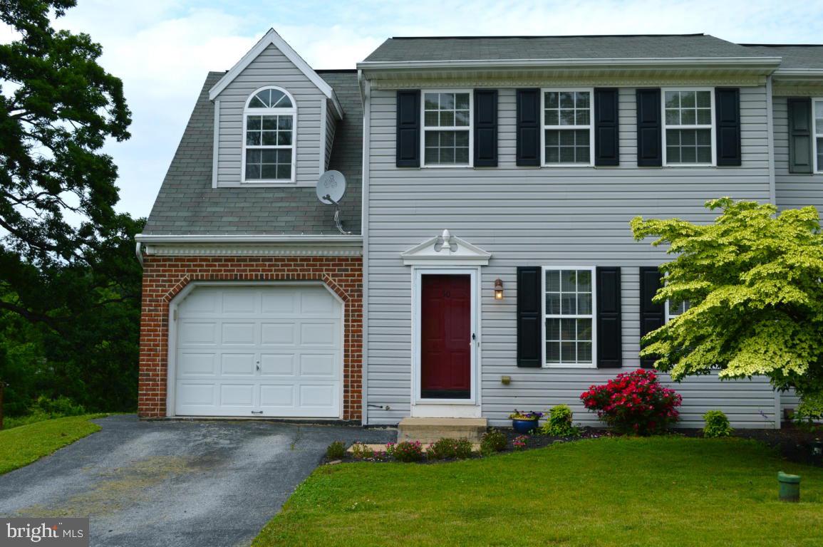 Warm and inviting town home in quiet cul-de-sac. Featuring 3 bedrooms, large deck overlooking peaceful and private back yard, walk-out finished basement, garage, and one year home warranty. Property is eligible for USDA Rural Housing Financing.