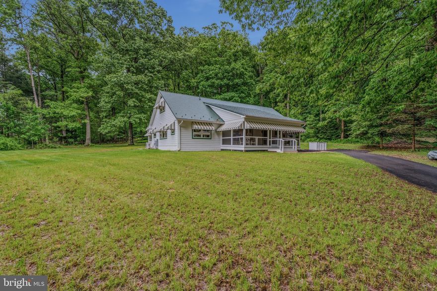 Perfectly located just minutes from the heart of both Hampstead and Westminster, this meticulously renovated four-bedroom home offers the perfect blend of peaceful country living and convenient access to shopping, dining, and everyday amenities — all set on over three beautiful acres.

Every inch of the property has been thoughtfully updated with extremely high-end craftsmanship and quality materials throughout, making this truly a move-in-ready opportunity. Recent major improvements include a brand-new roof, new windows, new well, new septic system, upgraded water filtration system, and extensive custom built-ins throughout the home.

Relax on the welcoming front porch or enjoy the spacious rear addition designed for comfortable everyday living and entertaining. Inside, the home is filled with warmth and personality, highlighted by a lovingly designed retro-inspired 1950s kitchen that brings charm and style together in the best way possible. Whether you appreciate vintage design or simply love a home with character, this space is unforgettable.

The thoughtfully designed layout includes two first-floor bedrooms, offering flexibility for guests, multi-generational living, or convenient one-level living. One bedroom features an en suite full bath, while the second offers its own en suite half bath. Upstairs, you’ll find two additional exceptionally large bedrooms, creating comfortable and versatile living spaces throughout the home.

The expansive basement offers endless possibilities with three egress windows, abundant storage, and the perfect opportunity to create a recreation room, gym, workshop, home theater, or additional living space.

This beautiful home has truly been gone through from top to bottom. From the major systems to the custom details, everything has been thoughtfully completed — all that’s left to do is move in and enjoy. see full list of updates below;


Front porch edition 2024
Back family room edition 2025
New Hvac 2025
House completely rewired 2025
New roof 2024 (40 year metal roof by Kasell and Irons)
New Windows 2024 (Anderson elite E series, architectural collection)
New well jet pump 2023
New septic tank 2023
Kitchen remodel (with new appliances ) 2025
Heat pump Daikin 2025
All new paint 2025
All new built-ins 2024
Oak floors completely redone in 2024
Custom-made patio Nicolock pavers 2025
Two new bathrooms, 2024
New driveway installed and 2025
Second floor, Marmoleum floors made by Forbo floors (eco-friendly)
Custom awnings made by Hawk Awnings 2025