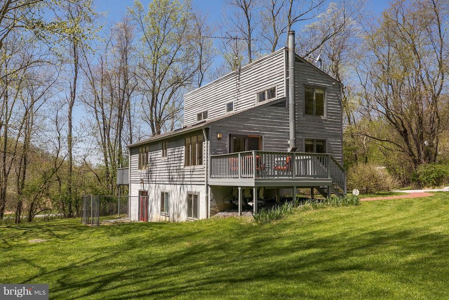 LOVELY, LIGHT FILLED CONTEMPORARY HOME ON OVER 3 ACRES IN THE COVETED HEREFORD SCHOOL ZONE! 3 FULL LVLS OF LIVING W/ LOVELY WDS FLRS, RENOVATED KIT, OPEN FLR PLAN W/ LVG RM, DNG RM & FAMILY RM W' WD BURNING WOOD STOVE, MAIN FLR MASTER BR & BA, BRIGHT 2ND LVL W/ 2 BRS, 1 FULL BA, TONS OF STORAGE, FIN WALK OUT LWR LVL W/FAM RM, BR, FULL BA & STORAGE GALORE & 2 DECKS OVERLOOKING A PARKLIKE SETTING!
