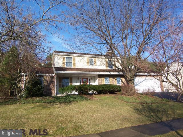Ideally located on a cul de sac in desirable Nittany Hills within the S.C. Borough this adored traditional-style home was tailor-made for family fun & entertaining friends. You'll find a lovely 2-story with appealing natural light & a gracious feel of hospitality. This residence has undergone numerous tasteful updates. Value a delightful eat-in kitchen, inviting family room w/grand stone fireplace and sliding glass door to a lovely stone patio retreat. A spacious living room, dining room, laundry/mud room & half bath w/granite top vanity complete the main living area. The upper level offers a master en suite, 3 additional bedrooms & full bath. An appealing lower level offers flexible space family/rec room, built-ins, w/office nook, storage room and convenient half bath. Be sure to take in views of Mt. Nittany. Also notable: tastefully landscaped, inviting covered front porch, 2-car garage, neighborhood paths provide easy access to campus & downtown. Radon Mitigated. Home Warranty.