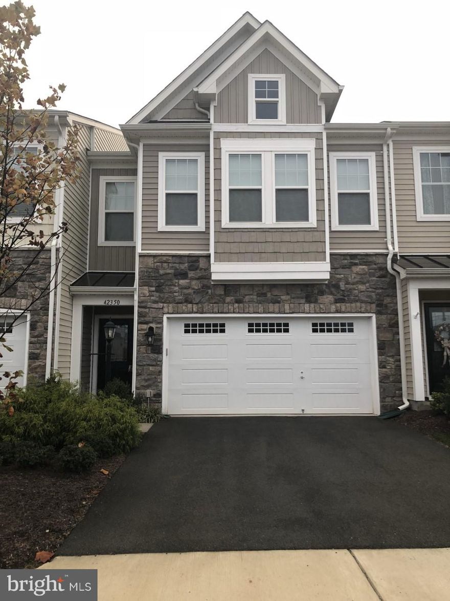 Former Model,STUNNING, Van Metre Middle Villa in Brambleton LandBay FOR RENT! Blinds will be added before Move-In! Verizon Internet & Basic Cable included! Gourmet Kitch w/granite,SS Apps, island w/brkfst br, gas cktop, wall oven, & built in microwave! Amenities: Basketball Courts,Bike Trail,Community Center, pool, tennis courts, playgrounds, & more. Main Level access. (No steps)