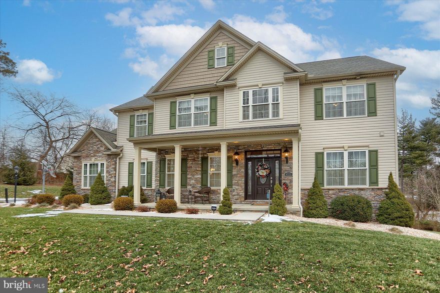 This home delivers comfort and convenience like no other! Pristine 3,200 square foot custom Yingst signature home with four bedrooms, 4.5 baths and a finished walkout basement. Including finished basement, this home provides more than 4,200 square feet of finished living space, second kitchen, game room and fourth full bath that is perfect for holiday gatherings. 1.81-acre lot surrounded by trees and offers a haven away from the busy world yet is convenient to everything you need such as grocery stores, Costco, and restaurants. Located in Lower Paxton Township just minutes from UMPC Community Osteopathic Hospital. Built 2015 and meticulously maintained, this home presents like new. Approaching this home, you will immediately notice the love and extra expense owners put forth that make this home such an excellent value. High performance fiberglass front entrance door with sidelights and transom, nine-foot ceilings and real hardwood floors throughout the first floor. Andersen windows, lighted closets, crown molding throughout except for bedrooms, side entry three car garage, 16’ x 40’ composite deck with aluminum railings, 12’ x 24’ shed with electric sub panel. Open floor plan with first floor great room with 17’ high ceiling, stone fireplace floor to ceiling and stunning windows that provide an abundance of natural light. Kitchen with quality custom cabinets, granite counters, center island, tile backsplash, stainless steel appliances, soft close drawers, gas range, pot filler and large pantry. Breakfast nook that overlooks rear yard where you can watch occasional visiting wildlife, formal dining room with back lighted trayed ceiling, first floor office with French doors located off the front foyer, half bath, open foyer, and stairs with wood-metal railing plus a servant’s staircase in rear of home. Second floor primary bedroom suite with trayed ceiling, primary bath with radiant heated tile floor, soaking tub, walk in tile shower with frameless glass doors, vaulted ceiling, double bowl vanity and more custom cabinetry. The second bedroom suite is ideal for guests and features a dedicated full bath with a transom above bathtub shower for added natural light. Two additional bedrooms with a Jack and Jill bathroom for a total of four bedrooms. Second floor laundry with wash sink, tile floor and is set up to accommodate gas or electric dryer. Finished basement with a wonderful second kitchen and huge bar counter with under counter LED lighting, great for hosting game nights! Spacious game room with second gas fireplace and walk-out to enclosed screened porch with lighting and exterior fan to keep you comfortable on warm days. Spacious yard with privacy on all sides and a fully approved storm water plan that will accommodate a 32’ x 56’ inground pool. High efficiency two stage HVAC system with three zones and thermostats on each floor for ultimate comfort. Tankless gas heater, 400 AMP electric service, hardwired cable jacks in every room, plumbed for central vacuum and basement utility room that also serves as large storage room. This home has it all, amenities, quality, privacy and is priced to move you!