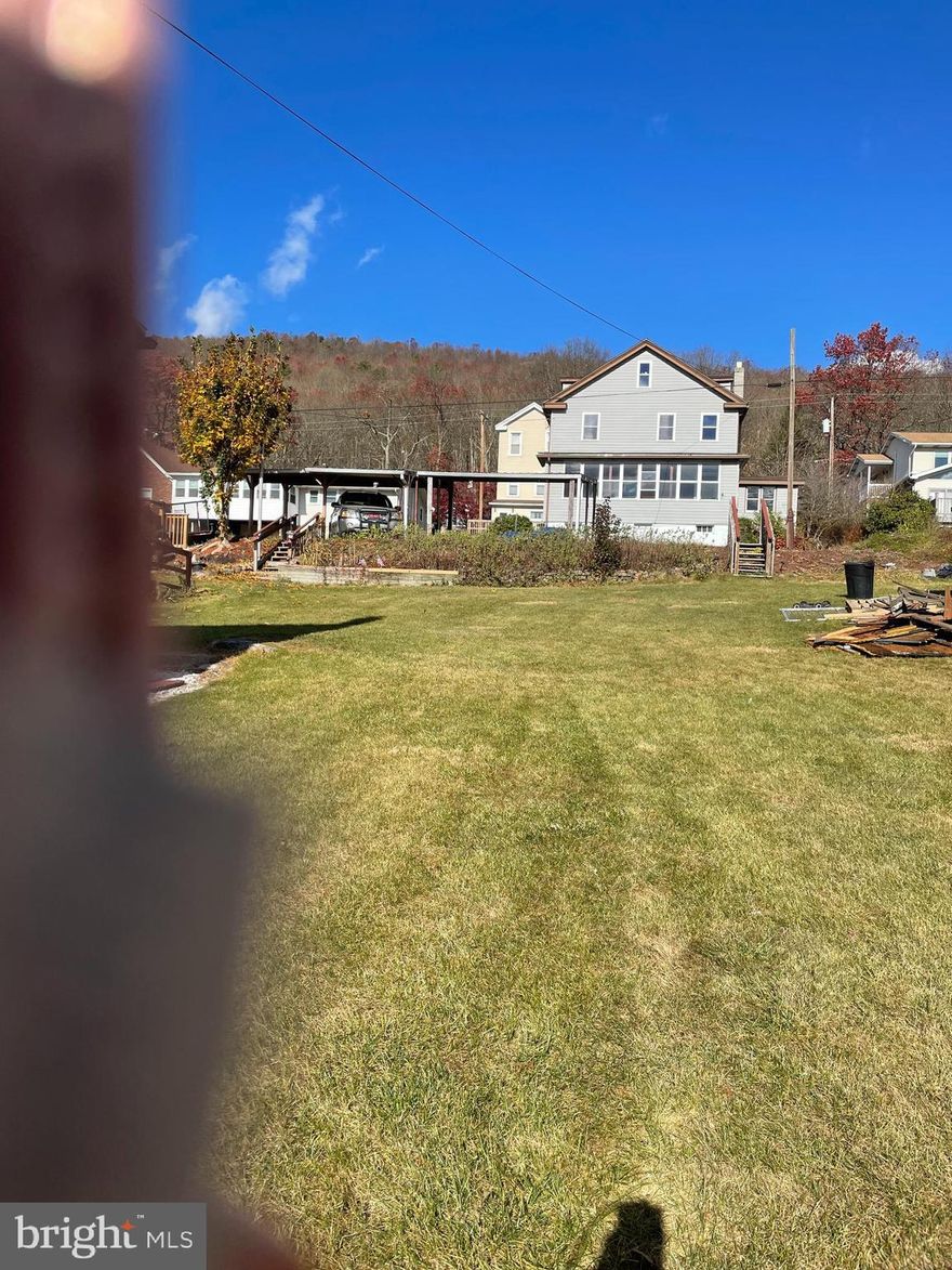 Approved building lot perfect for new construction.  Public water and sewer at street.  Property has beautiful mountain views and located on a quiet street.