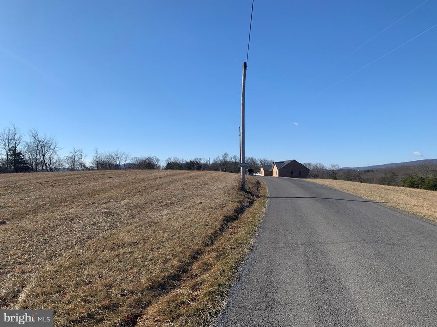 Beautiful cleared land with views.  Perk approved along the road frontage of Black Oak Road.  Taxes is on the whole 88.79 Acre parcel they own.  Taxes will be determined when the new deed is recorded.