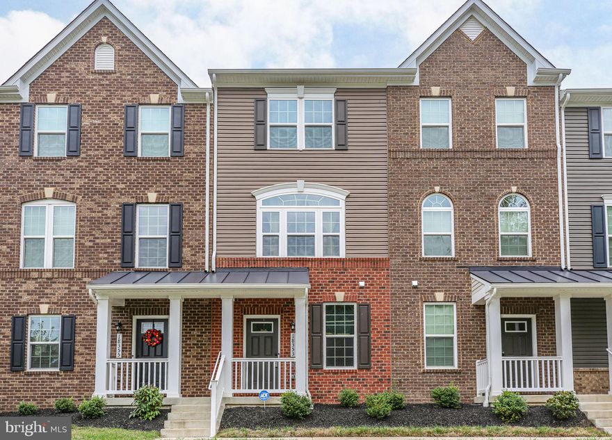Modern townhome bliss that’s a stone’s throw from Quantico and so much more? It’s all right here at 18353 Reaper Hill Court! Constructed in 2022 and showing like-new, this three-level townhome includes three bedrooms, 3.5 baths and more than 1,700 square feet of living space. The residence is nestled in the Eagle Row community, which includes an intimate collection of approximately 40 residences, a playground, small park and dog park. Zooming in on the plot here, the residence is tucked in a quaint row of four townhomes. Front yard landscaping is done by the HOA – low-maintenance heaven, folks! For parking, there is a concrete driveway and one-car garage. And, for additional parking, there is ample street parking, visitor parking and, for a fee, permanent spots are purchasable. For quieter moments and escapes, the back yard space includes a composite deck. The townhome follows Ryan Homes’ Auburn model and includes lovely bricking, dark gray siding and darker gray shutters. Heading inside and on the lower level, you’ll find a bedroom with an attached full bath, complete with a single sink and tub/shower combo. Note the dark grey luxury vinyl plank flooring throughout this level (and the upper level, too)! Upstairs and to the main level, you’ll find a living room space with a massive window, ceiling fan and, on the wall, a hook-up for a primo TV set-up. The natural light is stunning! Additional highlights include a half bath, an eat-in dining space with deck access and the kitchen. The kitchen includes espresso cabinets, granite countertops, an island, GE stainless steel appliances and a big sink. Up a set of hardwood stairs, you’re greeted with the primarily carpeted upper level. This level includes two bedrooms and two full baths. The primary suite includes a big window, double-doored closet and ensuite bath with a stand-up shower, two sinks and vinyl flooring. The additional full bath upstairs has a tub/shower combo and single sink. Of the additional bedrooms, note one that has attic access for bonus storage. For laundry, there’s a closet upstairs with stackable machinery! For added comfort, the home is equipped with a Nest thermostat, air purifier/humidifier and the HVAC has been seasonally maintained. Quietly nestled off US-1, you’re within minutes of Quantico (and its VRE station), I-95 access (Triangle) and a number of grocery, shopping and dining destinations! The home is a perfect mid-point between D.C. and Fredericksburg, each within 30 miles. Seamless Quantico, Fredericksburg and D.C. commutes await with this stellar location... let alone all the memories to be made within its charming confines! Book your showing of 18353 Reaper Hill Court today!