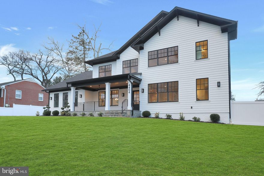 Welcome to 4404 Clearbrook Ln, a breathtaking 7,000 sq. ft. home in the heart of Kensington, seamlessly blending luxury, comfort, and convenience. Nestled on a picturesque flat lot, this 6-bedroom, 6.5-bathroom residence is designed for effortless living, featuring an inviting front porch, a spacious deck, and a beautifully landscaped backyard—perfect for both relaxation and entertaining. The main level includes a private in-law suite, ideal for guests or multi-generational living, while the three-car garage, complete with windows, plus an extended driveway, offers ample parking. For modern convenience, the home boasts 400 amps electrical panel, ensuring ample power for high-end appliances and future expansions, along with two electric car chargers for effortless EV charging. A backflow preventer adds an extra layer of protection to the home’s plumbing system. Hardwood floors span the main and upper levels, while the expansive finished basement features durable Luxury Vinyl Plank (LVP) flooring. The home is outfitted with Lifestyle Pella windows throughout, backed by a lifetime warranty, ensuring energy efficiency and long-term peace of mind. Built for both elegance and efficiency, this home includes a Trane gas furnace in the basement, a 16 SEER Trane heat pump on the second floor, and 2 tankless water heaters for endless hot water on demand. The architectural shingles come with a 40-year warranty, adding to the home’s durability. The gourmet kitchen is a chef’s dream, equipped with a 24” Thermador refrigerator, a 36” wide VentAHood range hood, and a 24” double drawer Jenn-Air refrigerator and Decor microwave drawer. Located just minutes from Grosvenor-Strathmore Metro, Rock Creek Park, and downtown Kensington’s charming shops, cafés, and farmers' market, this home is also part of the highly sought-after Walter Johnson High School cluster. With unparalleled space, state-of-the-art upgrades, and a prime location, this is a rare opportunity you won’t want to miss!