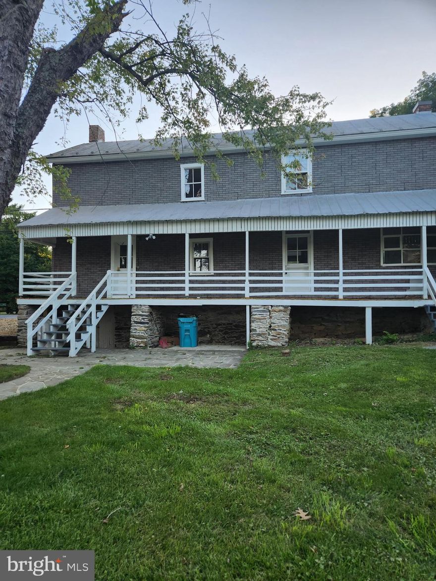 Welcome to the heart of Wolfsville! If you love small town living you will immediately fall in love with the charm of this historic building. This is unit B that is attached to the former corner store. The unit is much larger than it looks from the outside. Upstairs you will find 3 very large bedrooms and one full bath. There is an attic for extra storage as well. There are two stair cases. One that leads to the kitchen and one that leads to the foyer. The family room has a beautiful brick fireplace (sorry not for tenant use). The room has a ton of light and leads to the front porch that is perfect for people watching right on the corner. This would also make a great office or even use it as an additional bedroom if you dont need a closet. There is another living room on the main level right off the kitchen. The kitchen is small but efficient and has a door leading to back porch where you will find privacy and a huge yard! This property is attached to a commercial unit that will also be rented. If you love old world charm then bring your finishing touches and settle in.