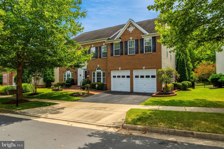 INTRODUCING 43945 Riverpoint Drive, an exceptional home located in the prestigious Lansdowne on the Potomac community. This meticulously maintained residence epitomizes elegance, featuring gleaming hardwood floors, high ceilings, and a sunlit, open floorplan.  The grand two-story hallway, with its architecturally stunning circular upper hallway, sets the tone for this special property. The formal dining and living rooms boast elegant crown molding and pristine hardwood floors. The gourmet kitchen is a chef's dream, equipped with white quartz countertops, gorgeous new marble backsplash, designer pendant lights, stainless steel appliances, and European-style cabinets. The sunroom/breakfast room adjacent to the kitchen offers access to a side Trex deck and a large, lighted stone and paver patio. The black wrought iron-fenced yard, surrounded by mature trees, backs onto a wooded common area, providing a private outdoor space with room for pets and other outdoor activities. The spacious family room, with its large windows, floods the area with natural light, making it perfect for entertaining. There is a main floor bedroom with closet which is being used as a study. Moving up the curved staircase to the upper level, the primary bedroom suite features dramatic vaulted ceilings, a spacious sitting area, and two walk-in closets with custom shelving. The ensuite primary bath offers double sinks, a soaking tub, and a standalone shower. The second floor includes four additional bedrooms, one with its own ensuite bath and walk-in closet with custom shelving. Two of the other bedrooms share a spacious Jack and Jill bathroom. A large, sun-filled 5th bedroom with beautiful hardwood floors, large windows and a new spacious walk-in closet can also be used as a family room/playroom/home office. The lower level is a haven for entertainment and relaxation, featuring a theater room with a ceiling-mounted projector and 8 ft wall screen, an exercise room, a large open area/game room, a new storage room or flex space with a refrigerator, and an additional full bathroom.  The most special feature on this level is a large new European-style wine cellar with decorative ceramic tile, a custom wall-mounted wine rack, and room for entertaining and wine tasting.  MAKE SURE to ask about the curated and fine wine collection and wine rack! ** 2-10 Home Warranty is transferable**   BUT WAIT, THERE IS MORE! This masterpiece home is located directly across from Loudoun County Riverpoint Drive Trailhead Park (formerly Kephart Bridge Landing Park), offering miles of walking trails along Goose Creek and the Potomac, with water activities such as tubing, kayaking, and fishing. Take your kayak out of the garage and literally WALK ACROSS THE STREET to beautiful Goose Creek to see Bald Eagles, Blue herons, Egrets, and turtles, and take relaxing walks along the water.  The Lansdowne community provides a plethora of amenities, including a 25-meter heated indoor lap pool open year-round, two outdoor pools, one at the Potomac Club featuring a resort-style pool with beach-entry, baby pool, three mushroom water fountains, bubble fountains, and a sand volleyball court,  Amenities also include three tennis courts, new 3600 sq ft state of the art fitness center, and a clubhouse with a meeting room, ballroom, business center, and game room. The HOA fee includes Xfinity high-speed internet and cable service.  LOCATION, LOCATION, LOCATION: The home is surrounded by nature yet only minutes from Leesburg Outlet Mall, Wegmans, Whole Foods, Costco, One Loudoun, Dulles Town Center, Top Golf, and various local restaurants, movie theaters, and shops. The home offers easy access to several major transit routes like Route 7 and 28, the Metro, and Dulles Airport. Don't miss the opportunity to own this exquisite home at 43945 Riverpoint Drive, where luxury and convenience meet.