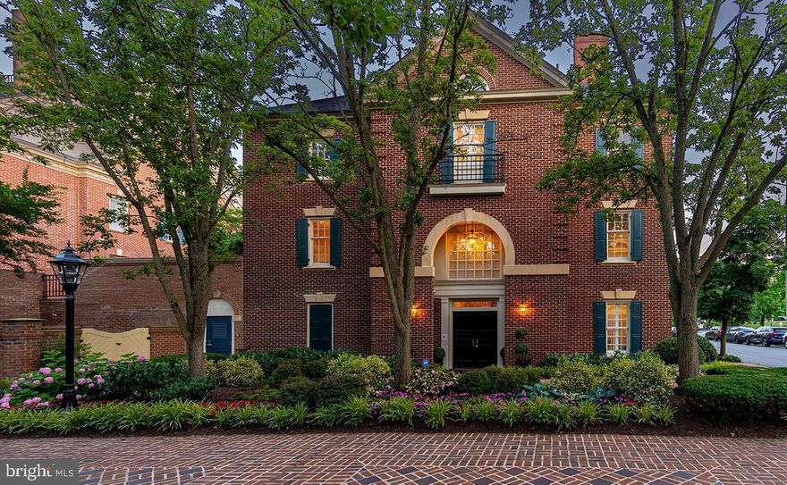 Ideally nestled in the gardens of prestigious and picturesque waterfront Harborside, in the heart of Old Town Alexandria near waterfront parks and just 4 blocks from Old Town's famed King Street, this sophisticated 4-level, 3688 sq ft residence is the epitome of elegance. 

This 4 bedroom 3.5 bathroom, end unit rowhome lives like a single-family home, with large, spacious rooms and lots of storage. It is one of two rarely available end units. This property features 3-sides of oversized windows on all 4 floors, allowing an abundance of natural light to pour through the property showcasing the pristine hardwood floors and exquisite woodwork found throughout the home. 

As you enter through the front door, you will be greeted with a beautiful 2-story foyer that opens into a large sitting room with gas fireplace and built-ins.  2 assigned garage PARKING spots are also just steps away!! Oh, and visitor parking too!! 

The main level features a large stunning eat-in kitchen featuring beautiful (new) granite countertops, (new) double ovens, wine cooler. The beautiful millwork arches lead into the large living room with gas fireplace and built-ins. From the spacious dining room and kitchen, new Pella French Doors open to the landscaped spacious terrace.  Enjoy the privacy of the gardens in your grand, bricked, walled private terrace, one of the largest and brightest in Harborside. 

 The next floor features the primary suite with gas fireplace, expansive closets, and newly updated en-suite , spa-like bathroom with dual sinks, soaking tub, shower and water closet. A completely remodeled bathroom and two other spacious bedrooms and full-sized laundry round out this level. 

The top floor is a large flexible space with renovated full bathroom and loads of storage.  A 4th bedroom, fitness room, office, craft room, wine storage, speakeasy, the choices are endless!

Tucked into this prime location, this home offers unparalleled access to waterfront parks, charming restaurants, and all the cultural delights that Old Town Alexandria has to offer. Meticulously cared for and thoughtfully designed, this home is a true masterpiece of luxury living.