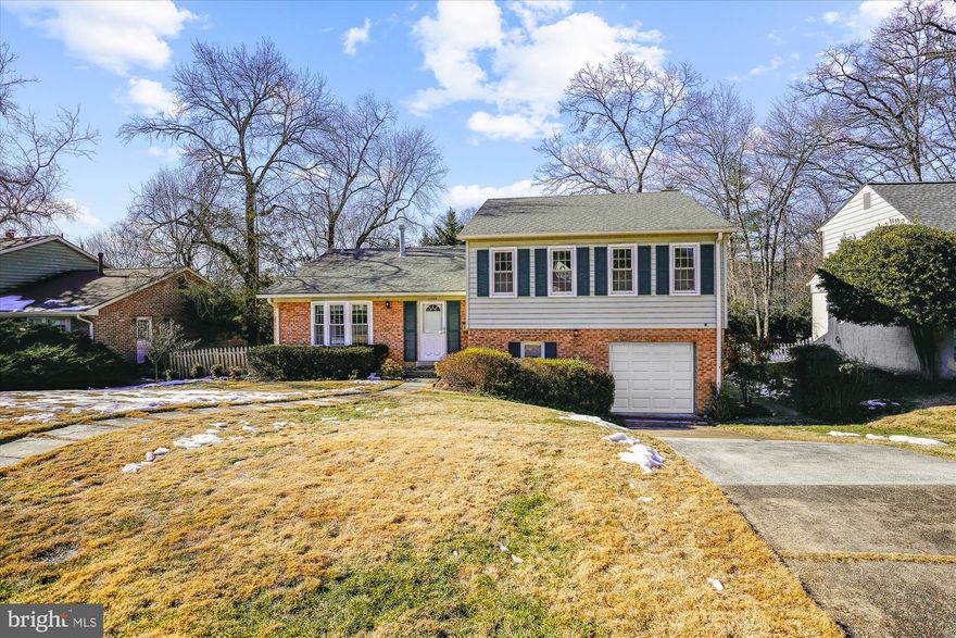 First time on the market in over 25 years!  Wonderful Potomac home which has been meticulously cared for over the years is finally available for purchase.  This 4 bedroom, 2 and a half bath home features an updated eat-in kitchen with brick exposure.  Stainless steel appliances and granite counters with a large bay window.  Beautiful hardwood floors in the dining and living rooms.  The lower level family room is accented with an additional brick wall and fireplace with sliding  glass doors to fenced backyard and patio.  Bonus playroom/rec room and large storage room + ½ bath and large garage. Upstairs enjoy 4 bedrooms with hardwood floors and 2 bathrooms.  The home is situated on a cul-de-sac and walking distance to schools.  Fantastic location close to shopping and highways.