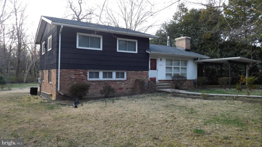 5 bedroom 2 bath split level with carport, has large 1/2 ac flat yard at end of cul-de-sac.  Sit on large deck and view woods and stream.  Updates include, redone kitchen and baths! New paint, new carpet in basement, newer windows, newer HVAC. Hardwood floors!  Sauna in 4th level.  Workshop and laundry room.  Rec room with wood stove.  Louvered blinds in living room with wood FP. Storage shed.