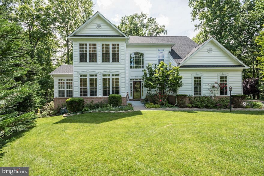 Stately single family colonial in spectacular condition! Gleaming wood floors on main level. Decadent sun-room with huge windows! Granite counters with island and cherry cabinets in kitchen! Oversized family room with fireplace and surround sound. BONUS office on main level w/ built in bookcase. BONUS screened in porch overlooking groomed & private backyard. BONUS bedroom and bath in basement.