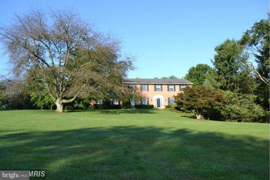 Gorgeous All Brick Colonial on quiet Lane in the Community of Quinn in Baldwin* High end renovations include Gourmet Kitchen w/Granite Counters, HW Flrs, Island w/2nd sink & Breakfast Bar, Upgraded Appl & Sub-Zero* Andersen Windows* 3 Zone HVAC (Natural Gas)* Stunning Master Bath w/Maax SpaTub & Glass seamless shower* Bright & Open Sunroom leads to Priv Paver Patio w/accent lighting & Gas Hook-up