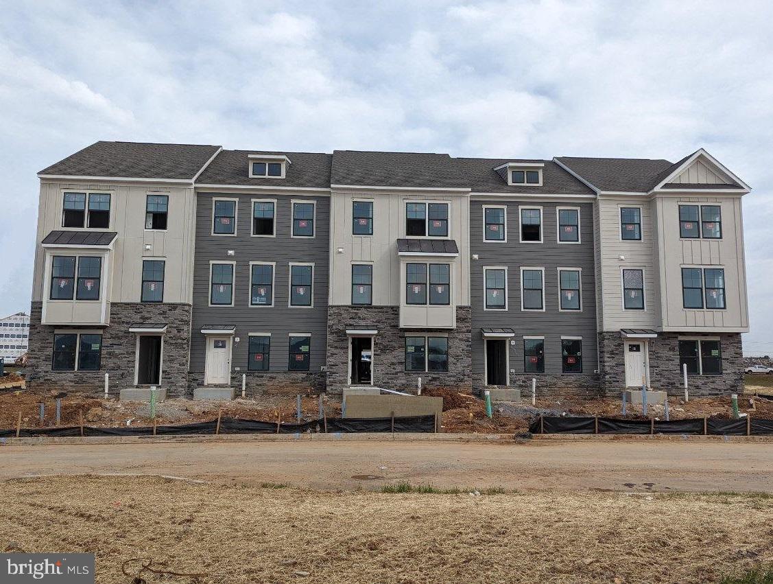 Spring delivery 1,962 sq foot, 4 bedroom, 3.5 full bathroom townhome with 30 year fixed rate financing as low as 5.5%! Make your buying power go so much further at D.R. Horton with DHI Mortgage. Promotional interest rates are available for homes that settle by the end of May! Do not wait! This limited time offer is too good to pass up! Amenities! Future Shopping! Walkability! Open Spaces! Trails! Creeks! And So, so Much More! The Renn Quarter by D.R. Horton is our newest and most sought-after Lifestyle community, located in extremely desirable Historic Downtown Frederick! Minutes from shopping, parks, and dog parks, Renn Quarter offers it all! In addition to the location, this townhome has soaring 9-foot ceilings, stainless steel appliances, wall to wall luxury plank floors, hardwood stairs, 2” faux wood blinds, spacious master bathroom, walk in closets and so much more! Nestled in the first section of D.R. Horton’s Renn Quarter community, this home is in walking/biking distance of Downtown Frederick! It is the last residential community that will be considered walkable downtown and is the location of the future Carroll Creek Walkway Extension. Not to mention this community will be amenity filled and you do not need to leave home if you don’t want it! Why not have all the conveniences and benefits of Historic Frederick, while living in a brand new, modern home? Contact us today to schedule a showing today! *A decorated model is on-site to help you envision your furniture in your future home*